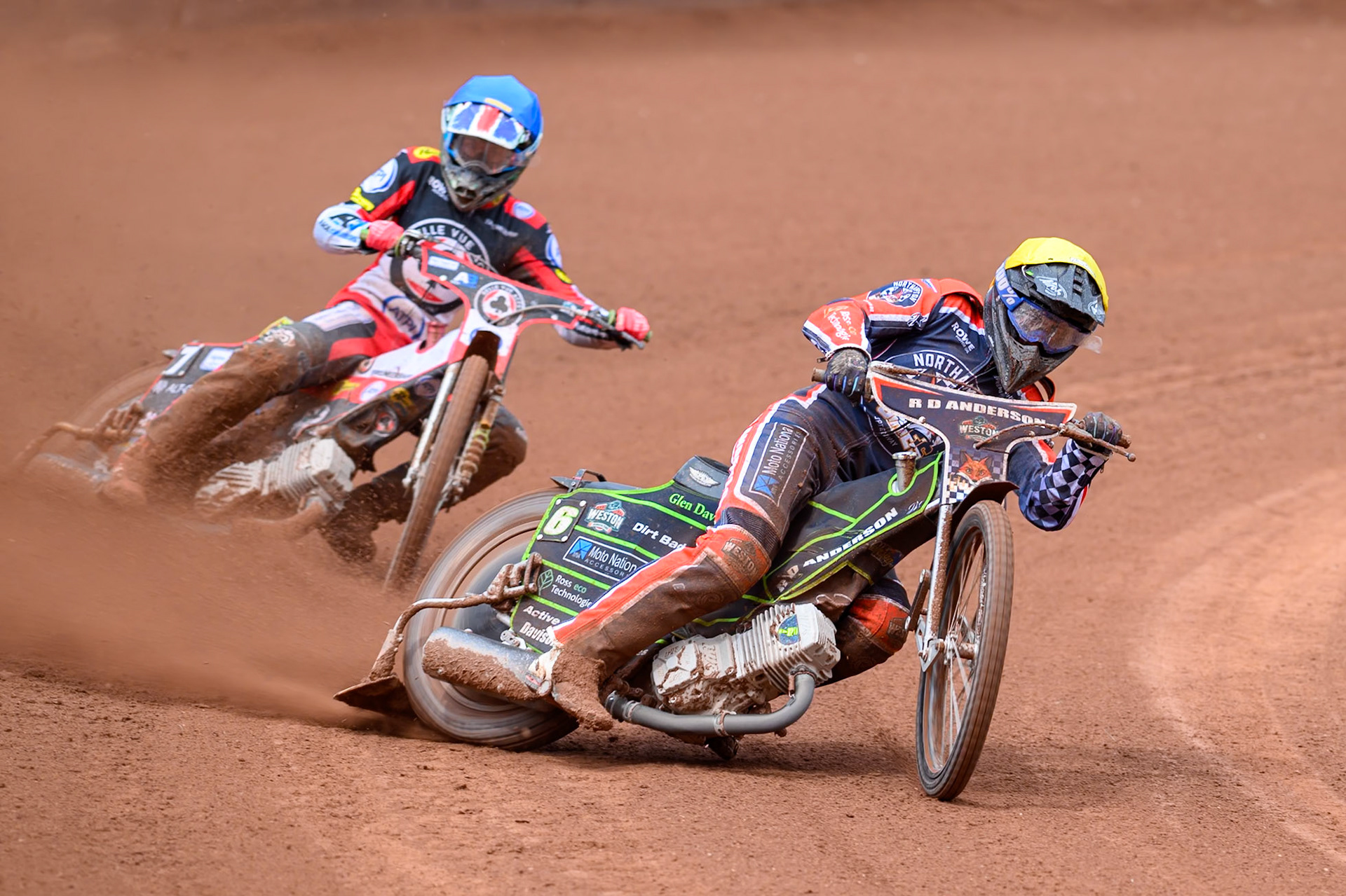 Kye Thomson of Northampton Foxes in Yellow leading Will Cairns of Belle Vue Aces in Blue during the Rowe Motor Oil Premiership match between Belle Vue Aces and Northampton Foxes at the National Speedway Stadium, Manchester on Monday 4th May 2026. (Photo: Ian Charles | MI News)
