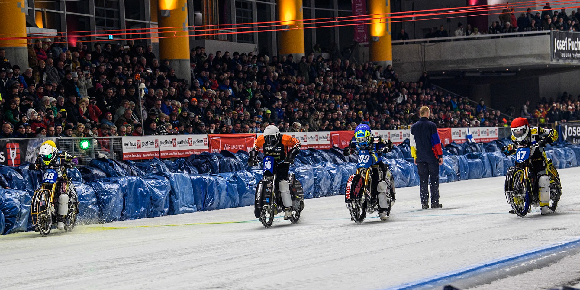 The Saturday Final start: (L to R) Germany's Max Niedermaier (88) (Yellow) Finland's Aki Ala-Riihimäki (66) (White), Sweden's Martin Haarahiltunen (199)  (Blue) Finland's Heikki Huusko (67) (Red) during the FIM Ice Speedway Gladiators World Championship Final 1 at the Max-Aicher-Arena, Inzell on Saturday 23 March 2024. (Photo: Ian Charles | MI News)
