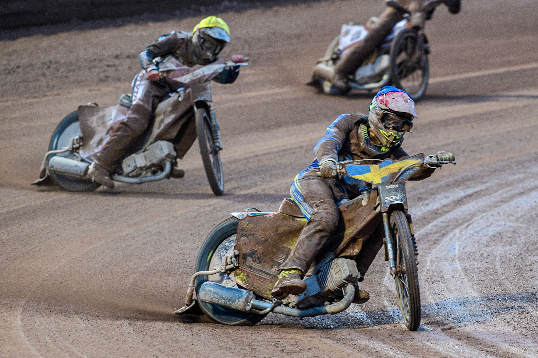 Casper Henriksson of Sweden in Blue leading Nikita Kaulins of Latvia in Yellow during the Monster Energy FIM Speedway of Nations 2 (Under 21) Final at the National Speedway Stadium, Manchester on Friday 12th July 2024. (Photo: Ian Charles | MI News)