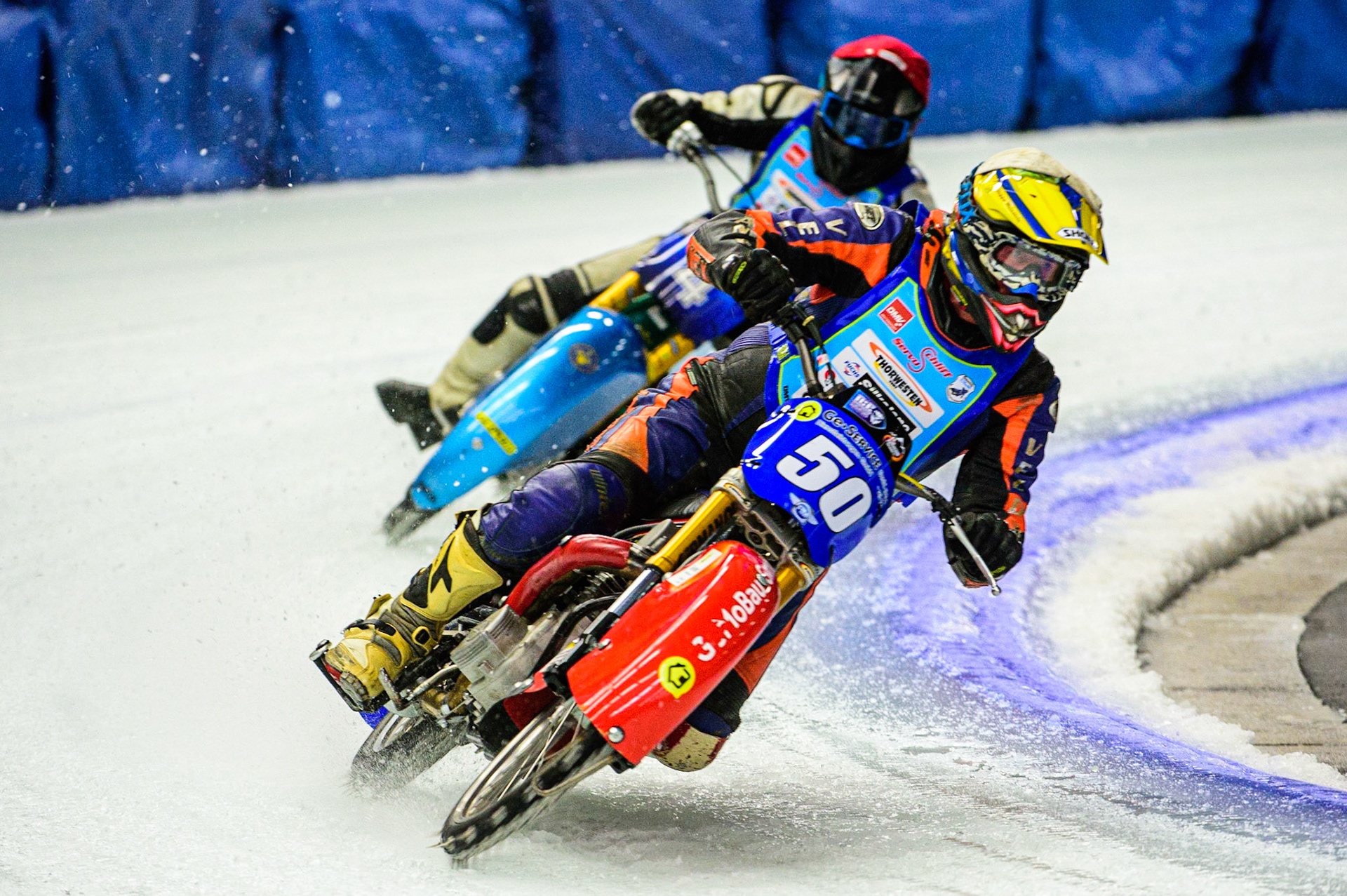 Josef Böhm (Yellow) leads Beat Dobler (Red) during the Race of Legends at the Max-Aicher-Arena, Inzell on Friday 17th March 2023. (Photo: Ian Charles | MI News)