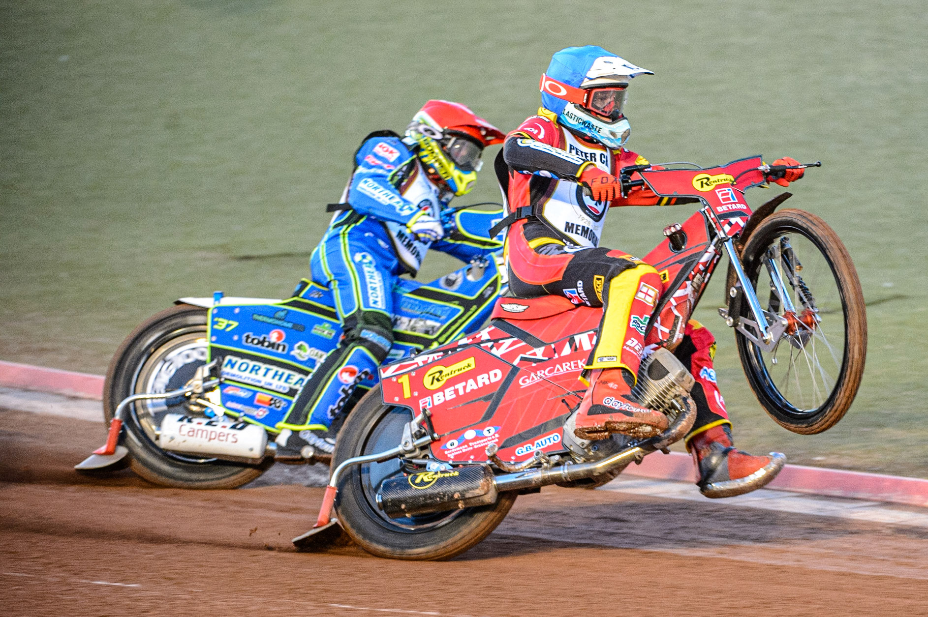 Max Fricke  (Blue) picks up some drive outside Chris Harris (Red)  during the Peter Craven Memorial Trophy  at the National Speedway Stadium, Manchester on Monday 3rd April 2023. (Photo: Ian Charles | MI News)