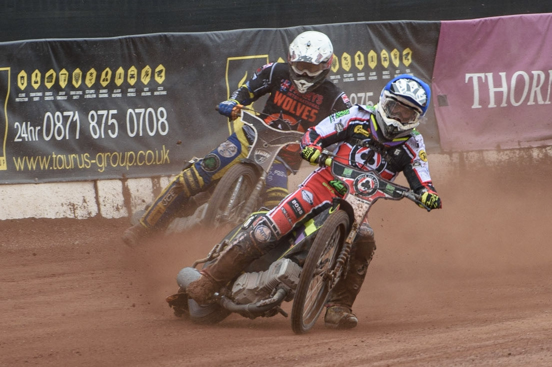 MANCHESTER, UK. AUGUST 30TH Tom Brennan  (Blue) leads Richard Lawson  (White) during the SGB Premiership match between Belle Vue Aces and Wolverhampton Wolves at the National Speedway Stadium, Manchester on Monday 30th August 2021. (Credit: Ian Charles | MI News)