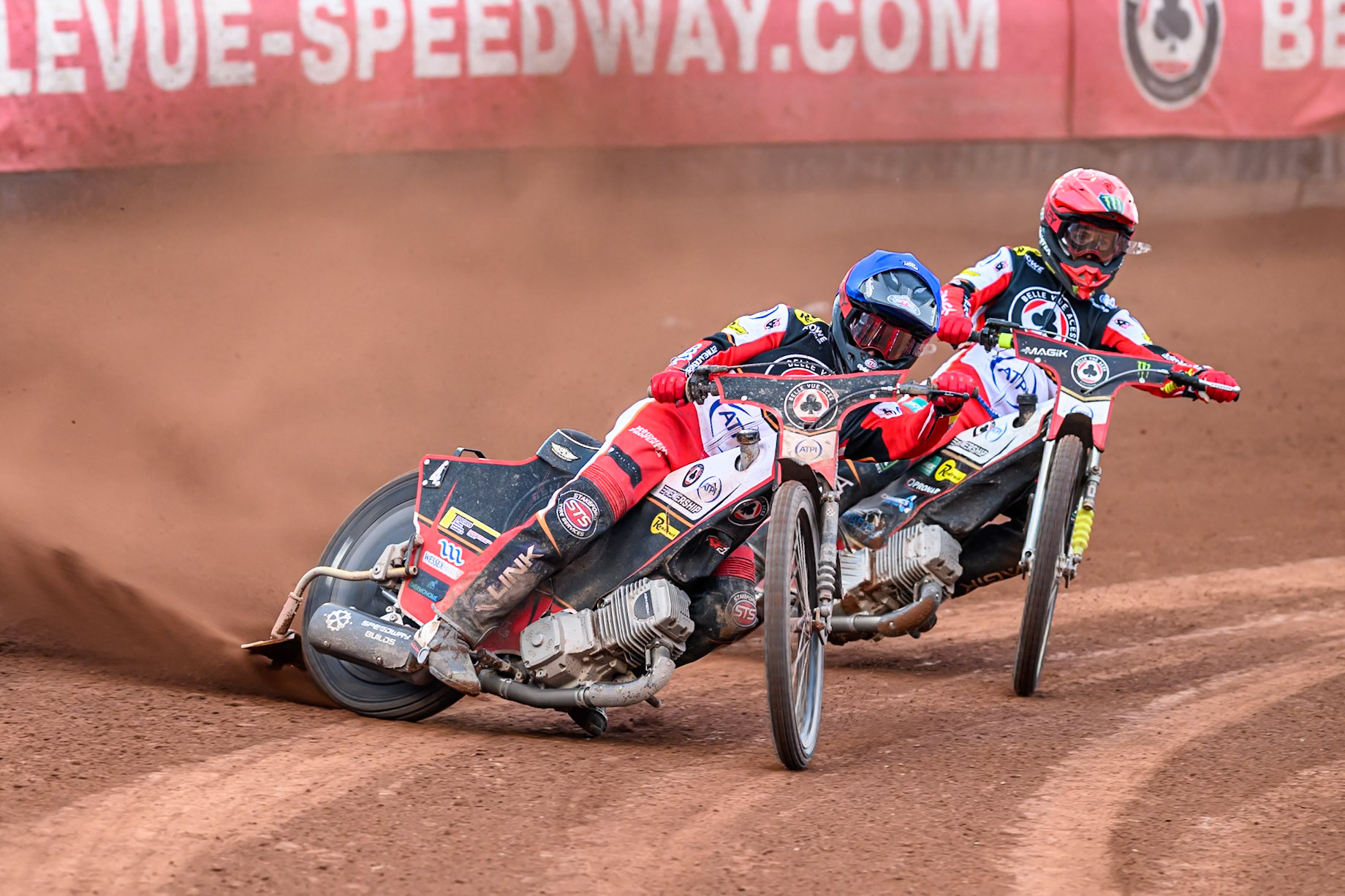 Belle Vue Aces' Zach Cook in Blue leading team mate Jaimon Lidsey in Red during the Rowe Motor Oil Premiership match between Belle Vue Aces and King's Lynn Stars at the National Speedway Stadium, Manchester on Monday 23rd June 2025. (Photo: Ian Charles | MI News)