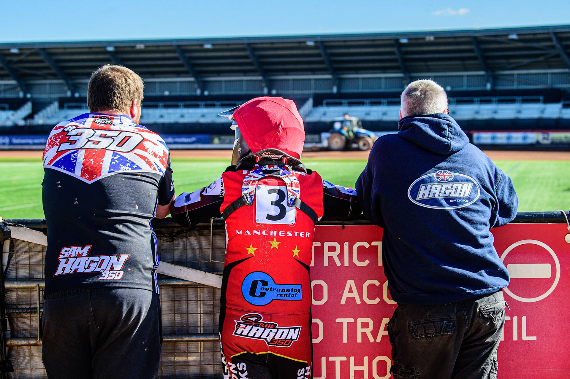 Sam Hagon  (centre) with his team watch the track prepduring the National Development League match between Belle Vue Colts and Berwick Bullets at the National Speedway Stadium, Manchester on Friday 7th April 2023. (Photo: Ian Charles | MI News)