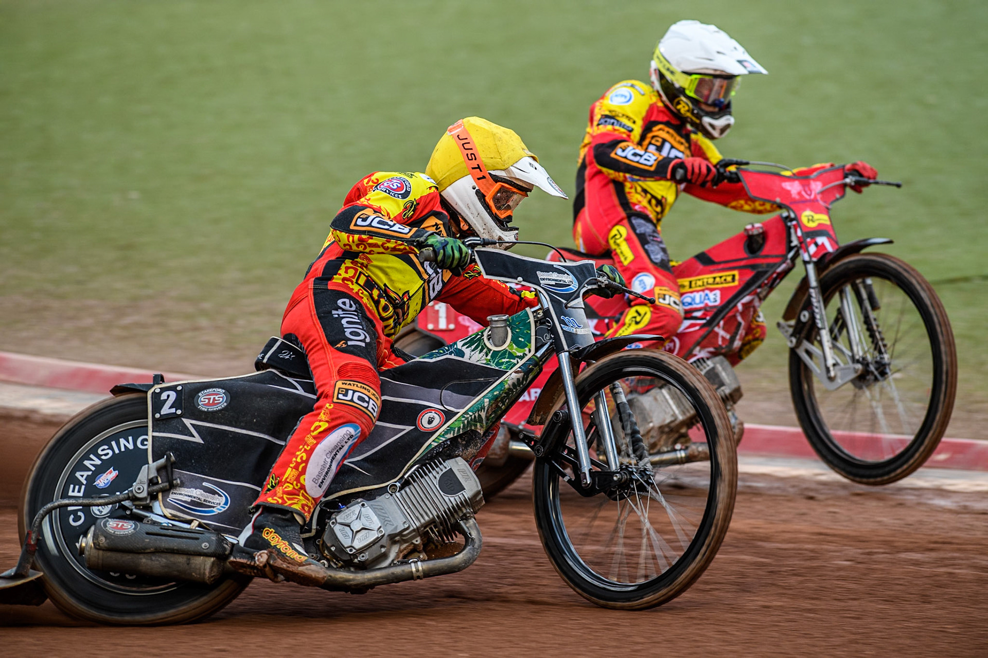 Leicester Lions' Richard Lawson in Yellow rides outside team mate Leicester Lions' Max Fricke in White during the Rowe Motor Oil Premiership match between Belle Vue Aces and Leicester Lions at the National Speedway Stadium, Manchester on Monday 24th June 2024. (Photo: Ian Charles | MI News)