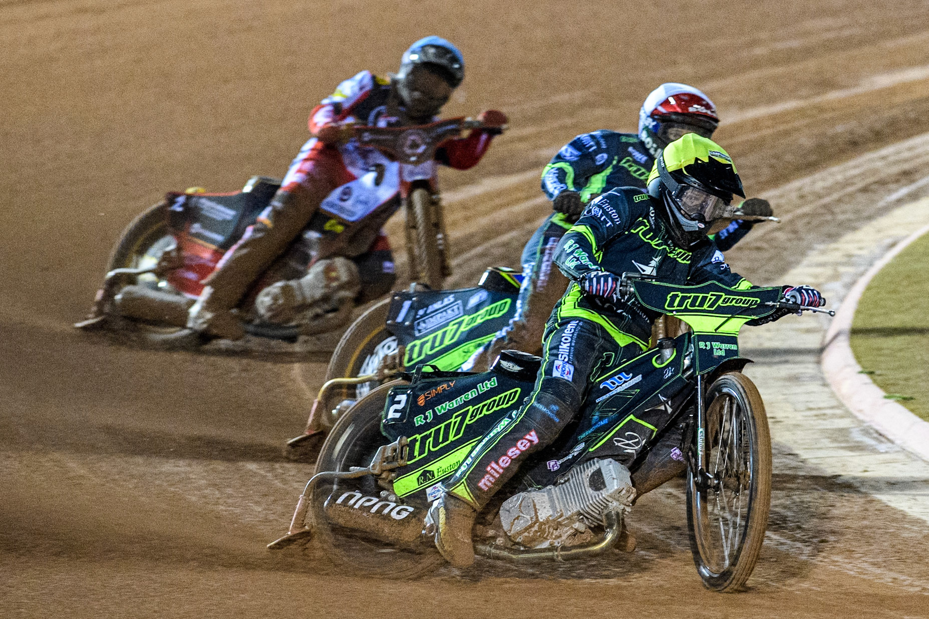 Danny King of Ipswich Witches in Yellow leading Jason Doyle of Ipswich Witches in White and Norick Blödorn of Belle Vue Aces in Blue during the Premiership Cup Quarter Final 1st Leg match between Belle Vue Aces and Ipswich Witches at the National Speedway Stadium, Manchester on Monday 24th March 2025. (Photo: Ian Charles | MI News)
