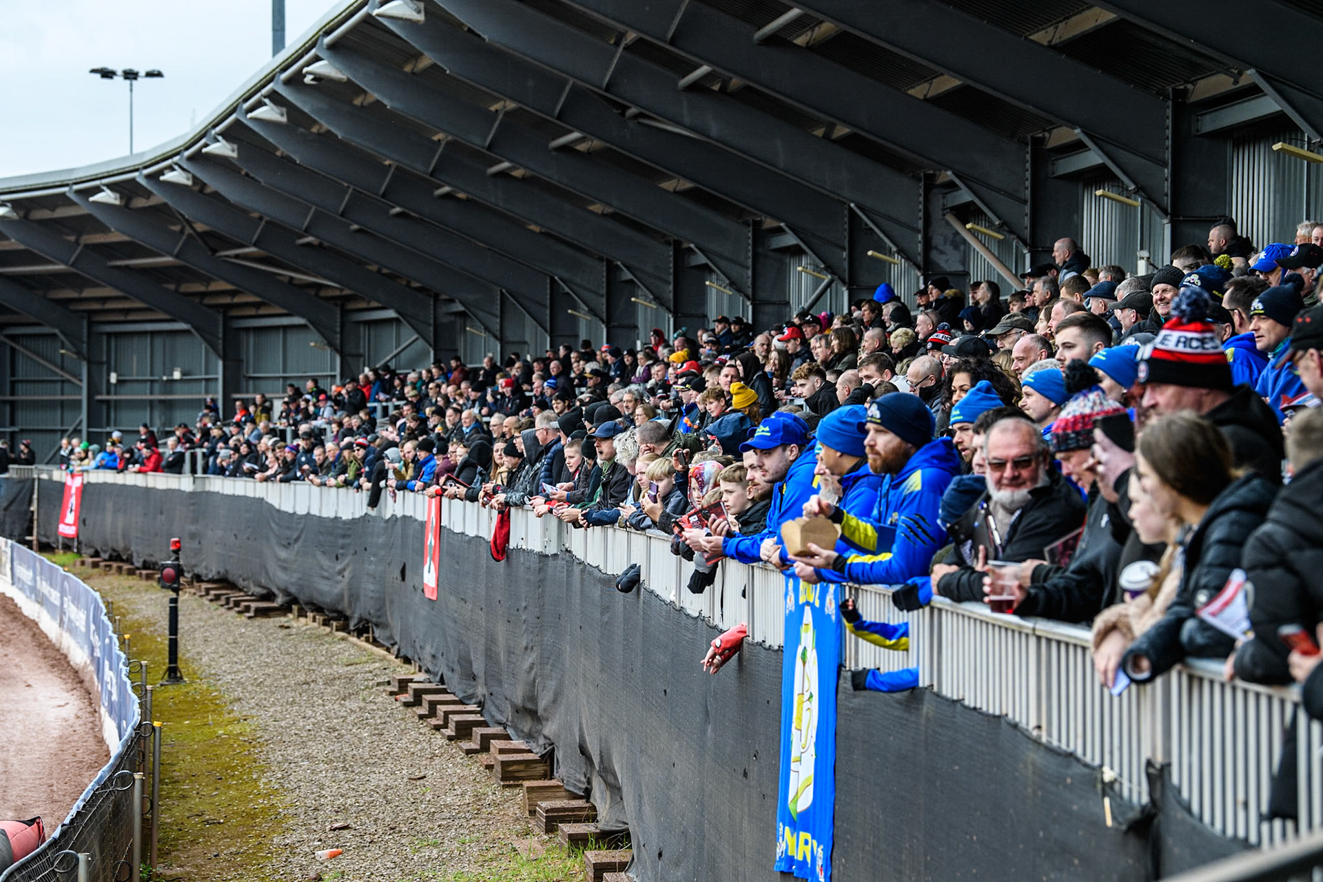 A large bank holiday crowd on the back straight during the Rowe Motor Oil Premiership KO Cup Quarter Final 1st Leg between Belle Vue Aces and Sheffield Tigers at the National Speedway Stadium, Manchester on Monday 1st April 2024. (Photo: Ian Charles | MI News)