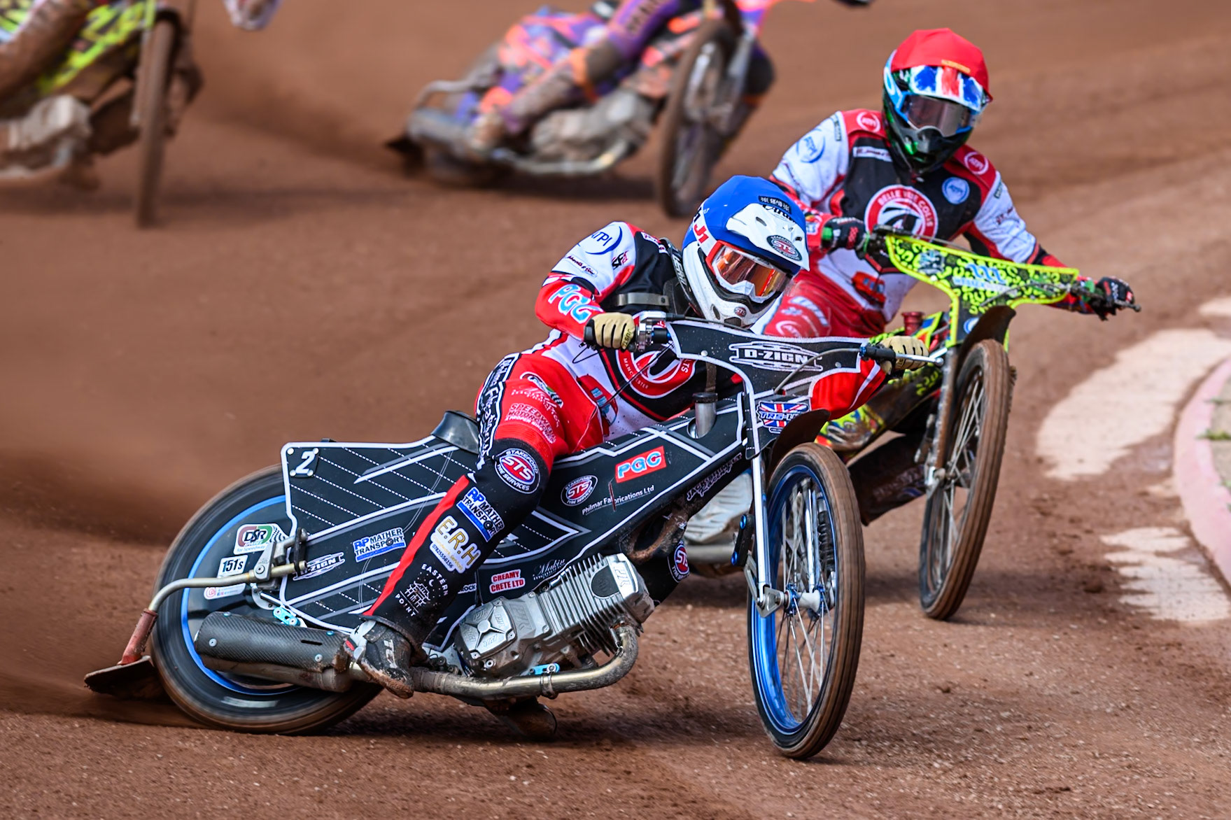 Jack Shimelt of Belle Vue Colts  in Blue leading William Cairns of Belle Vue Colts in Red during the WSRA National Development League match between Belle Vue Colts and Middlesbrough Tigers at the National Speedway Stadium, Manchester on Sunday 10th August 2025. (Photo: Mark Fletcher | MI News)