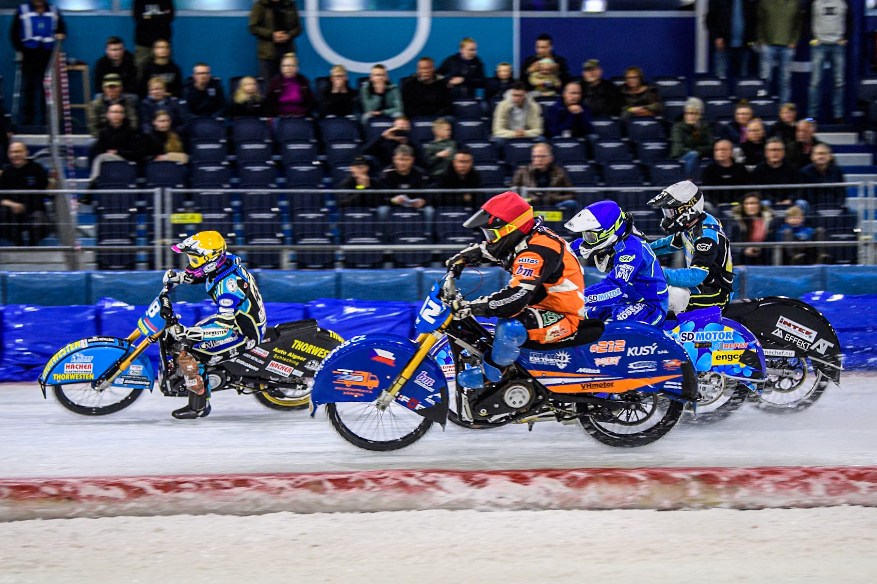 Luca Bauer (48) of Germany in Yellow leading Lukas Hutla (212) of the Czech Republic in Red Jimmy Olsén (81) of Sweden in Blue and Filip Jäger (719) of Sweden in White during the FIM Ice Speedway Gladiators World Championship, Final 4 at the Ice Stadium, Thialf, Heerenveen on Sunday 6th April 2025. (Photo: Ian Charles | MI News)