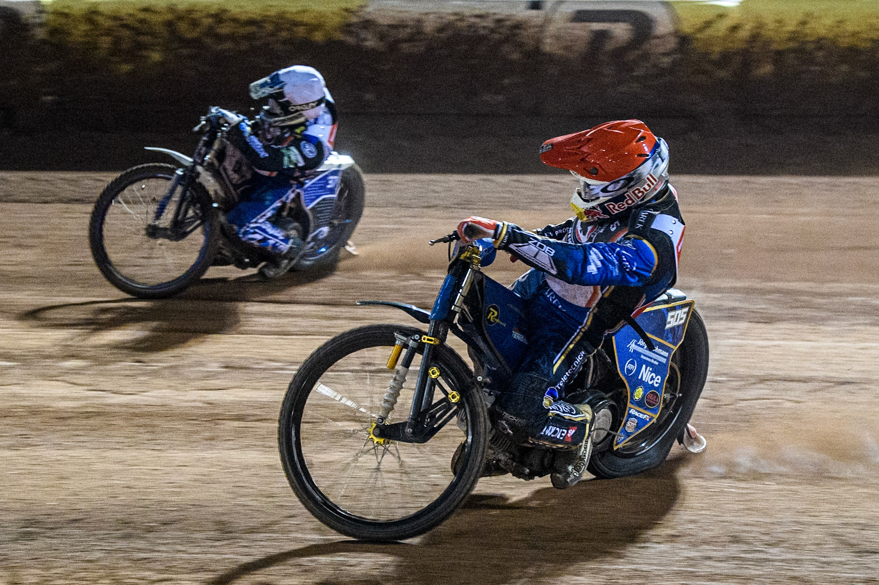 Robert Lambert in Red chases Chris Harris in White during the Peter Craven Memorial Trophy at the National Speedway Stadium, Manchester on Monday 17th March 2025. (Photo: Ian Charles | MI News)