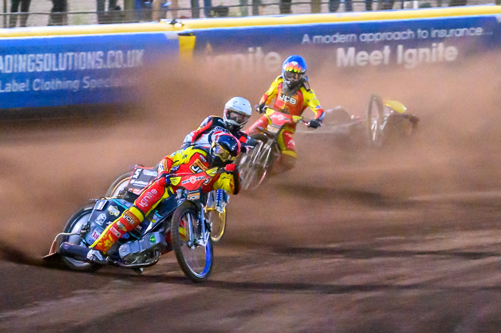 Ryan Douglas of Leicester Lions in Red leading Jason Doyle of Belle Vue Aces  in White  and Drew Kemp of Leicester Lions in Blue  as Tate Zischke of Belle Vue Aces  in Yellow  falls behind them during the Rowe Motor Oil Premiership match between Leicester Lions and Belle Vue Aces at the Hydroscan Arena, Leicester on Monday 7th September 2026. (Photo: Ian Charles | MI News)