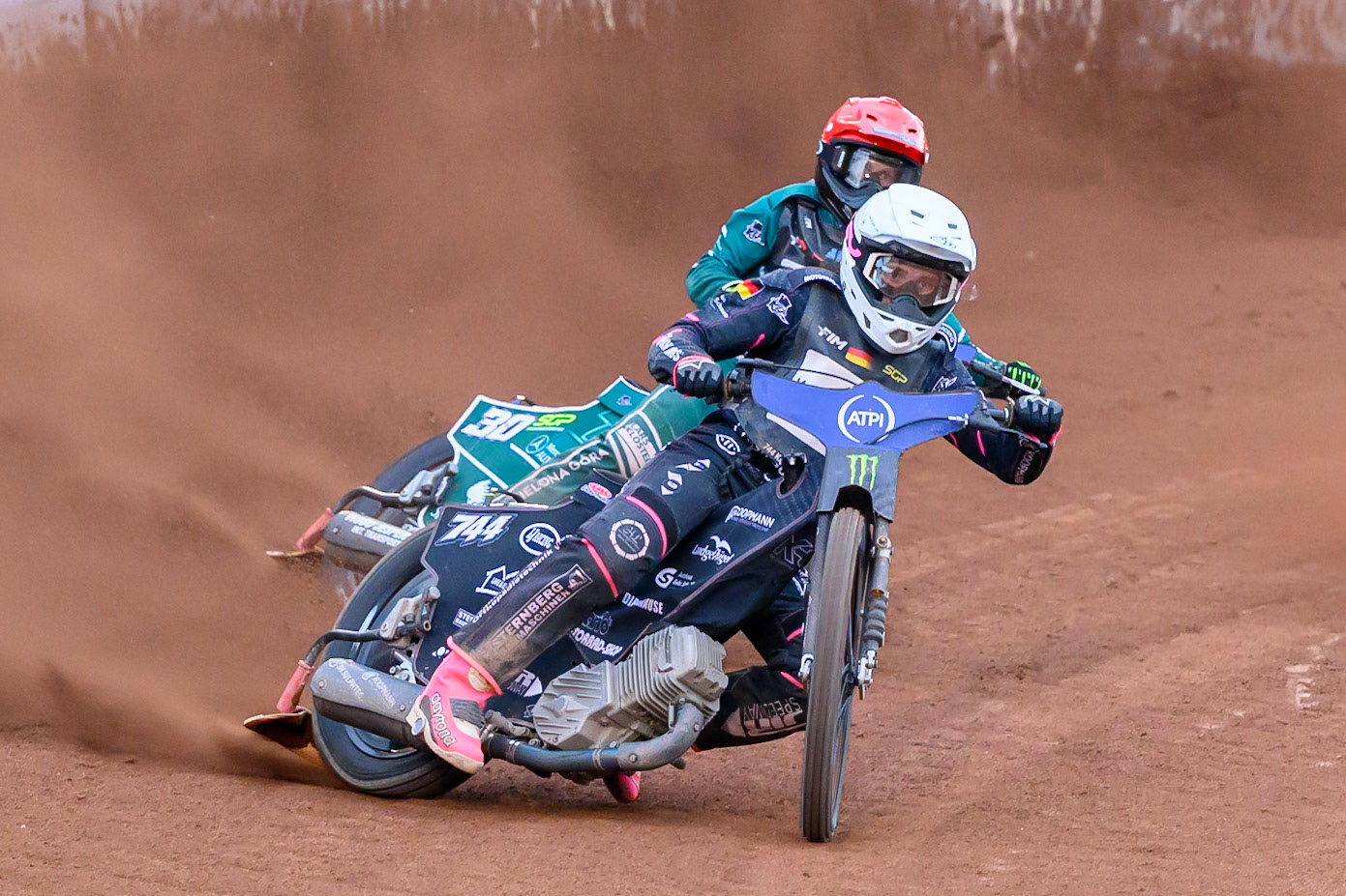 Kai Huckenbeck (744) of Germany in White leading Leon Madsen (30) of Denmark in Red during the ATPI  FIM Speedway GP of Manchester at the National Speedway Stadium, Manchester on Friday 5th June 2026. (Photo: Ian Charles | MI News)