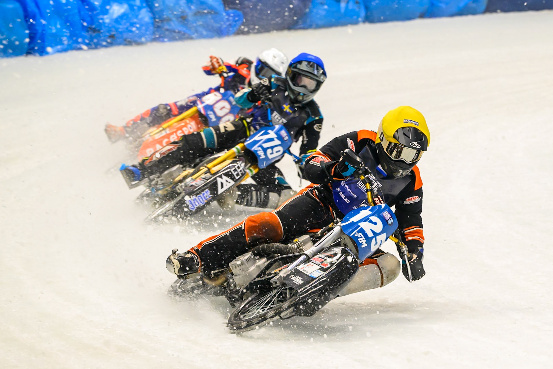 Sebastian Reitsma (125) of The Netherlands in Yellow leading Filip Jäger (719) of Sweden in Blue and Jasper Iwema (800) of The Netherlands in White during the Ice Speedway Gladiators World Championship Final 2 at Max-Aicher-Arena, Inzell on Sunday 15th March 2026. (Photo: Ian Charles | MI News)