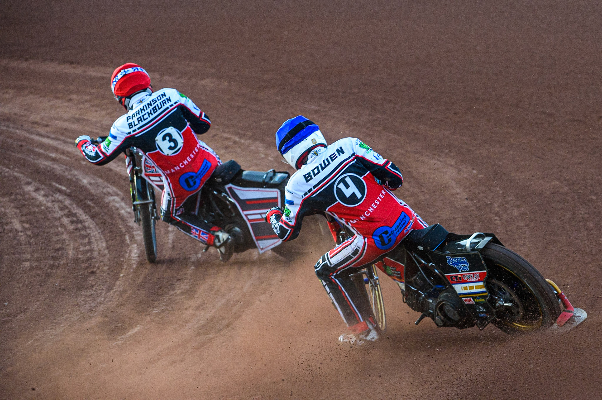 MANCHESTER, UK. JULY 23RD  Jack Parkinson-Blackburn  (Red) and Paul Bowen  (Blue) en route to a second maximum points heat win during the National Development League match between Belle Vue Colts and Eastbourne Seagulls at the National Speedway Stadium, Manchester on Friday 23rd July 2021. (Credit: Ian Charles | MI News)