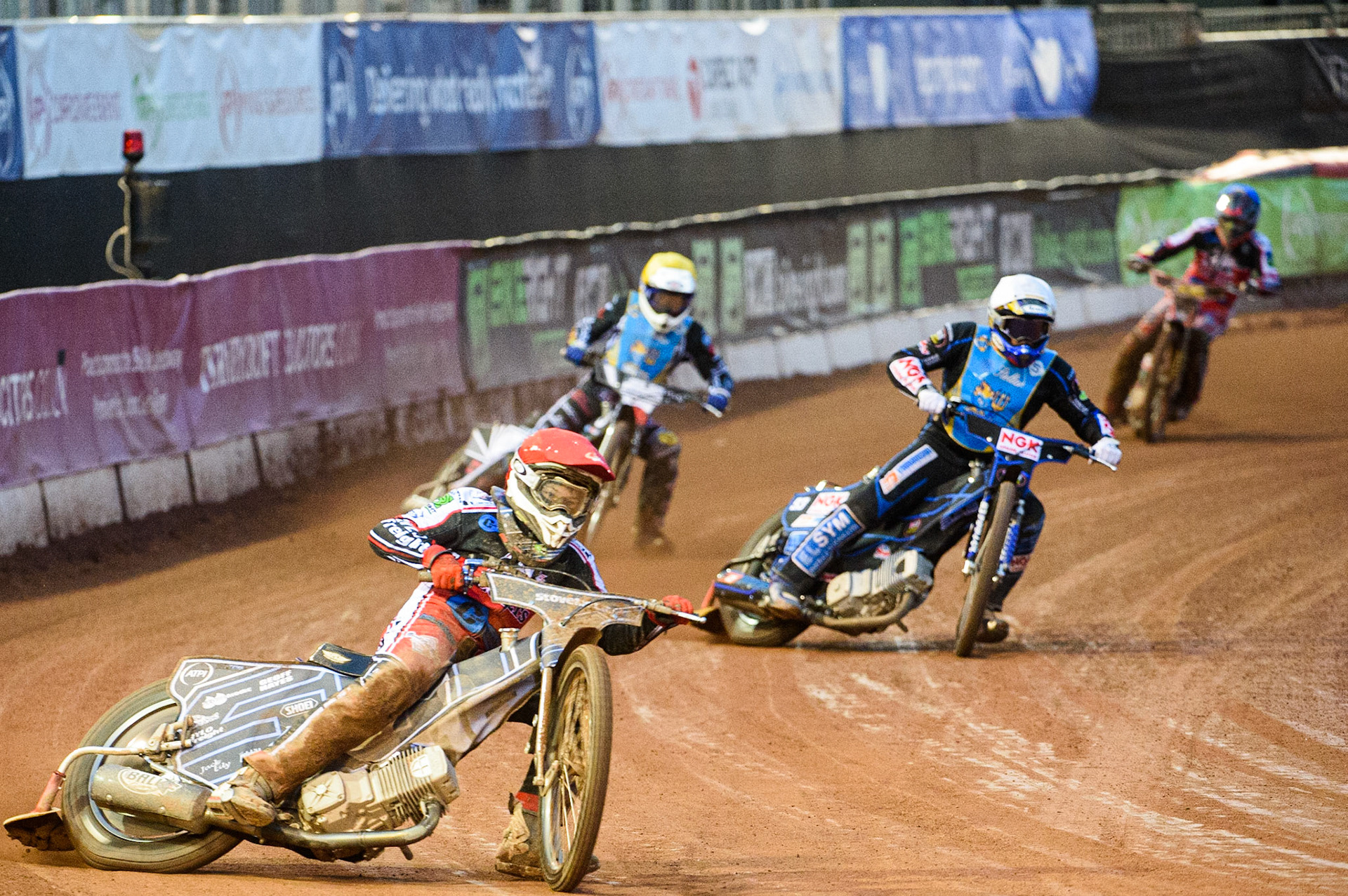 MANCHESTER, UK. AUGUST 20TH  Sam McGurk  (Red) leads Tom Woolley  (White) Archie Freeman  (Yellow) and Jack Parkinson-Blackburn  (Blue)  during the National Development League match between Belle Vue Aces and Armadale Devils at the National Speedway Stadium, Manchester on Friday 20th August 2021. (Credit: Ian Charles | MI News)