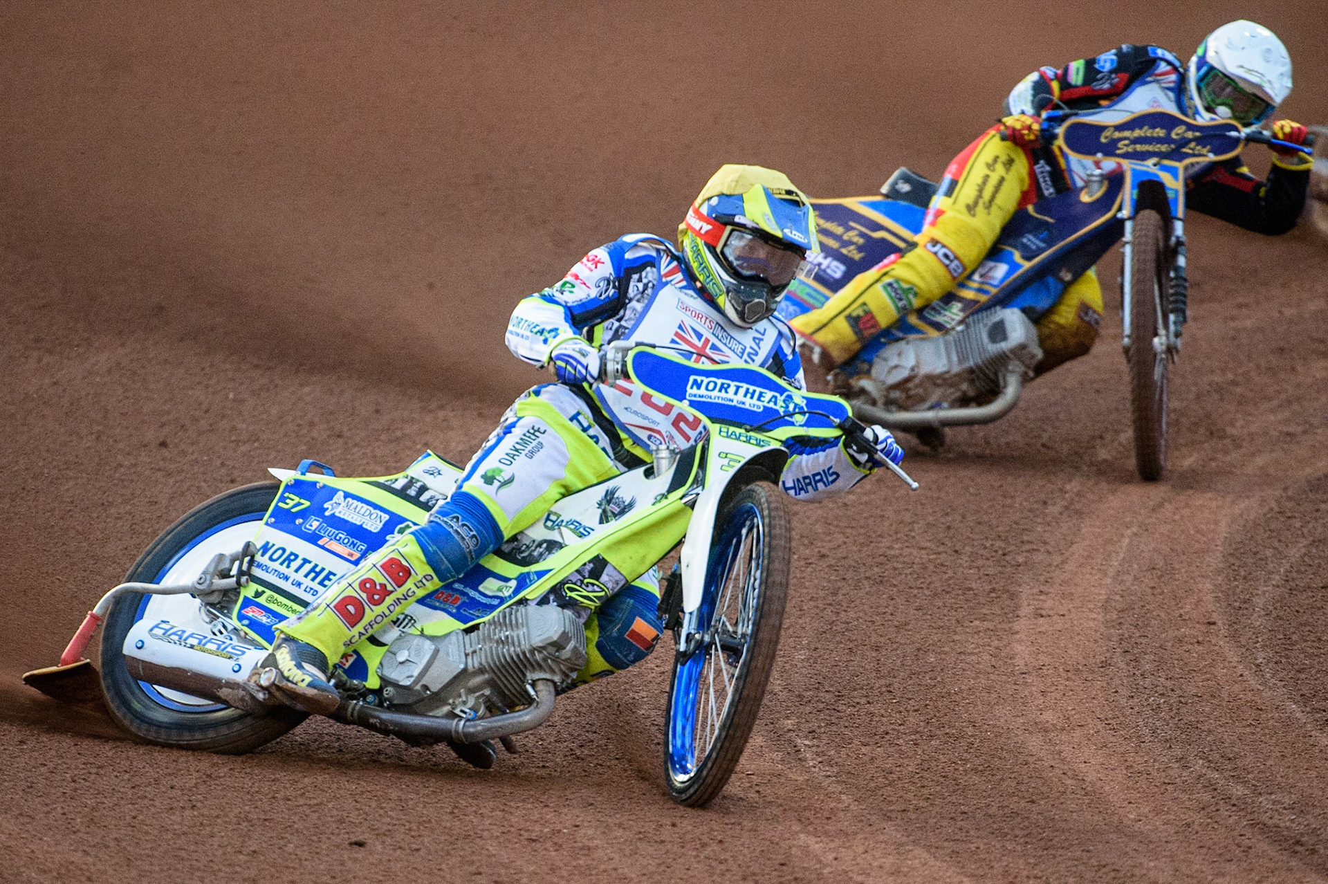 MANCHESTER, UK. AUGUST 16TH   Chris Harris  (Yellow) leads Kyle Howarth  (White) during the Sports Insure British Speedway Finals at the National Speedway Stadium, Manchester on Monday 16th August 2021. (Credit: Ian Charles | MI News)