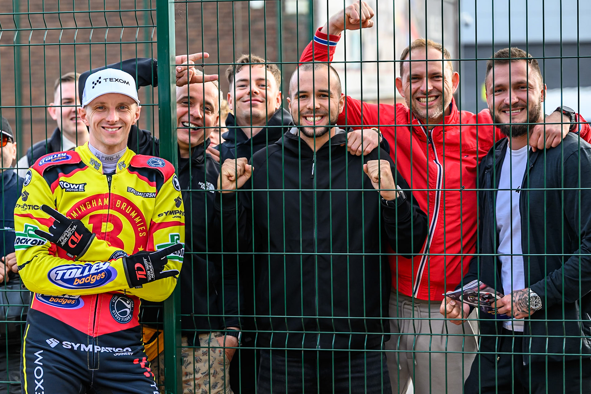 Birmingham Brummies' Tobias Musielak  and a group Polish Fans outside the pits during the Rowe Motor Oil Premiership match between Belle Vue Aces and Birmingham Brummies at the National Speedway Stadium, Manchester on Monday 7th July 2025. (Photo: Ian Charles | MI News)
