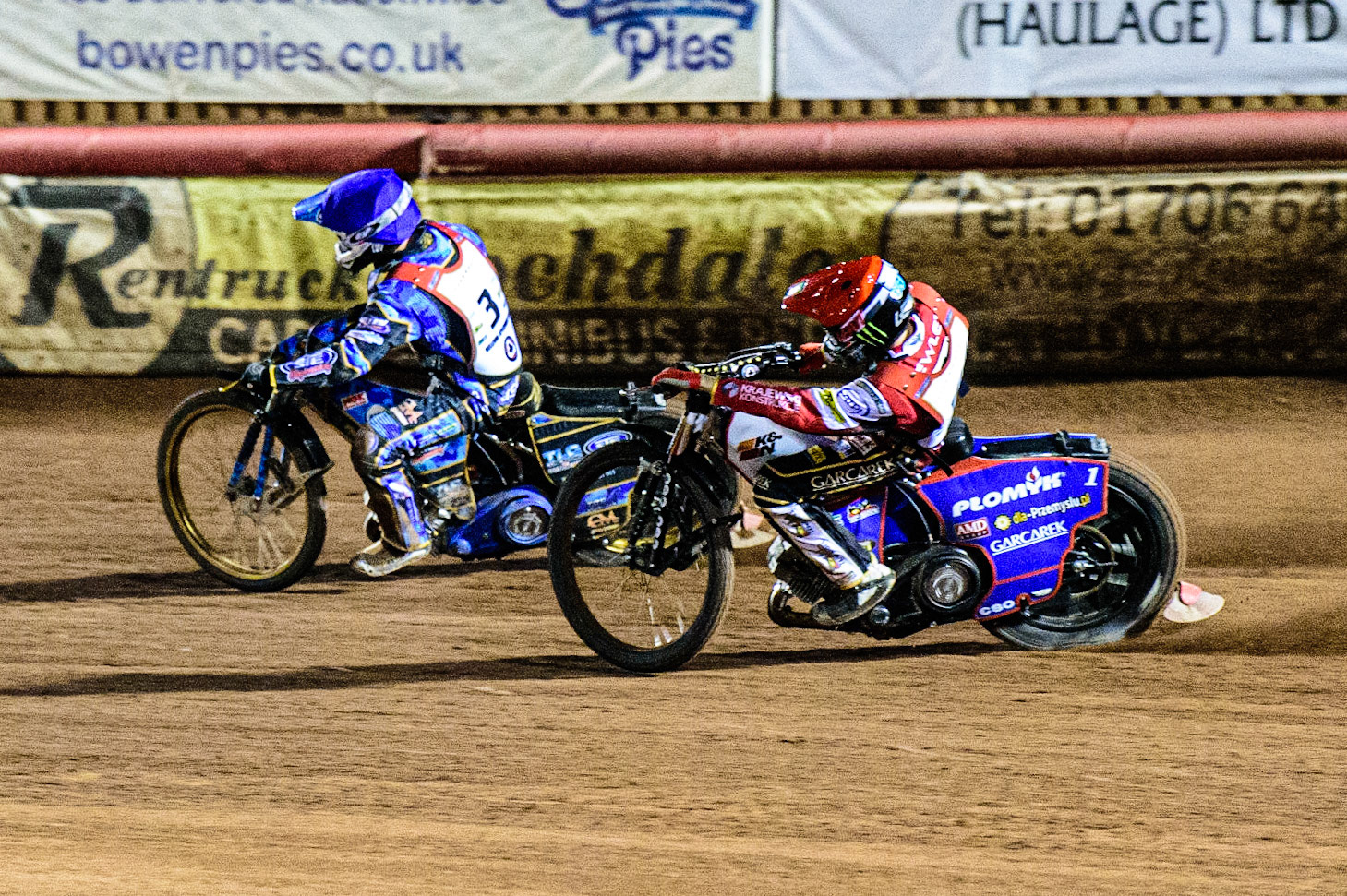 Dan Bewley  (Red) chases Justin Sedgmen  (Blue) during the Peter Craven Memorial Trophy  at the National Speedway Stadium, Manchester on Monday 3rd April 2023. (Photo: Ian Charles | MI News)