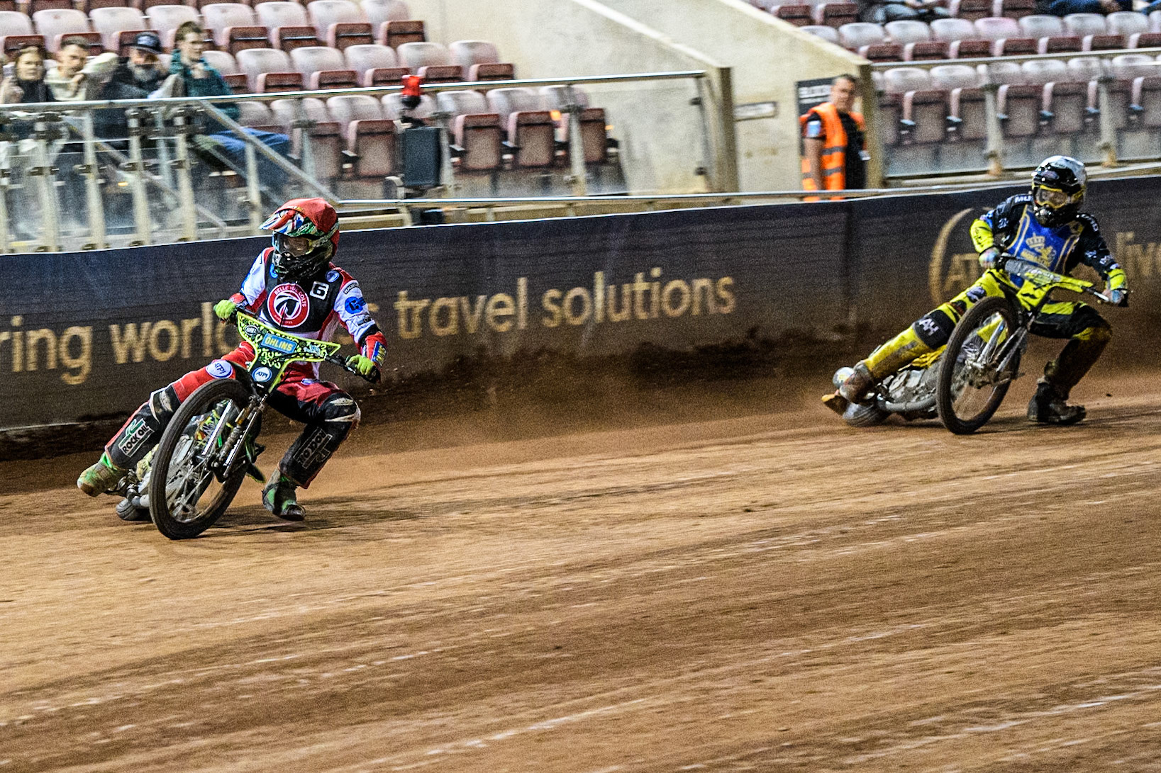 Belle Vue Colts' William Cairns in Red leading Edinburgh Monarchs' Dayle Wood in White during the WSRA National Development League match between Belle Vue Aces and Edinburgh Monarchs at the National Speedway Stadium, Manchester on Friday 30th August 2024. (Photo: Ian Charles | MI News)