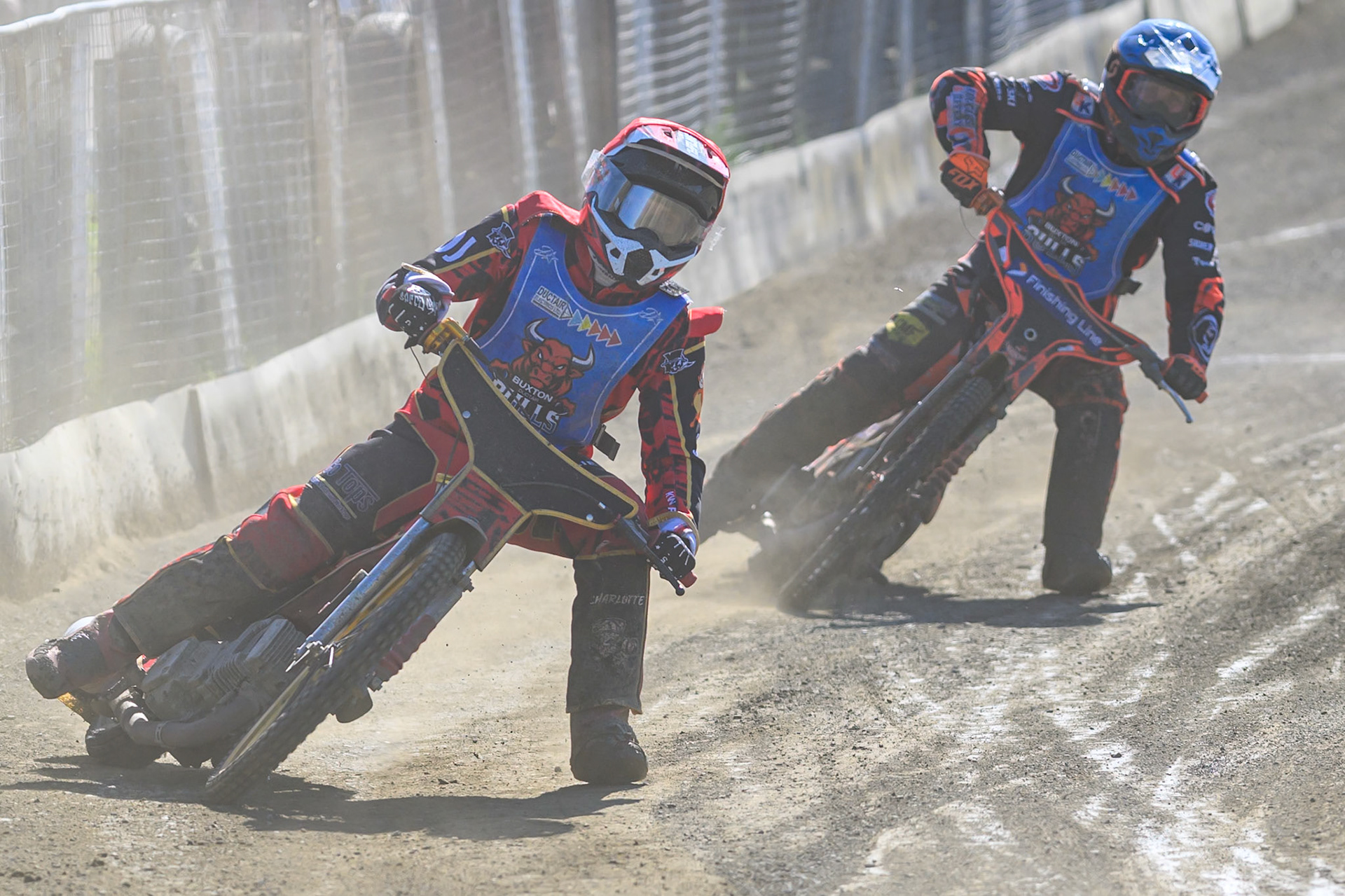 Luke Harris of Buxton Bulls in Red leading team mate Alex Spooner guest rider for Buxton Bulls in Blue during the National Development League Challenge match between Buxton Bulls and Stoke Potters at Hi-Edge Speedway, Buxton on Sunday 24th May 2026. (Photo: Ian Charles | MI News)