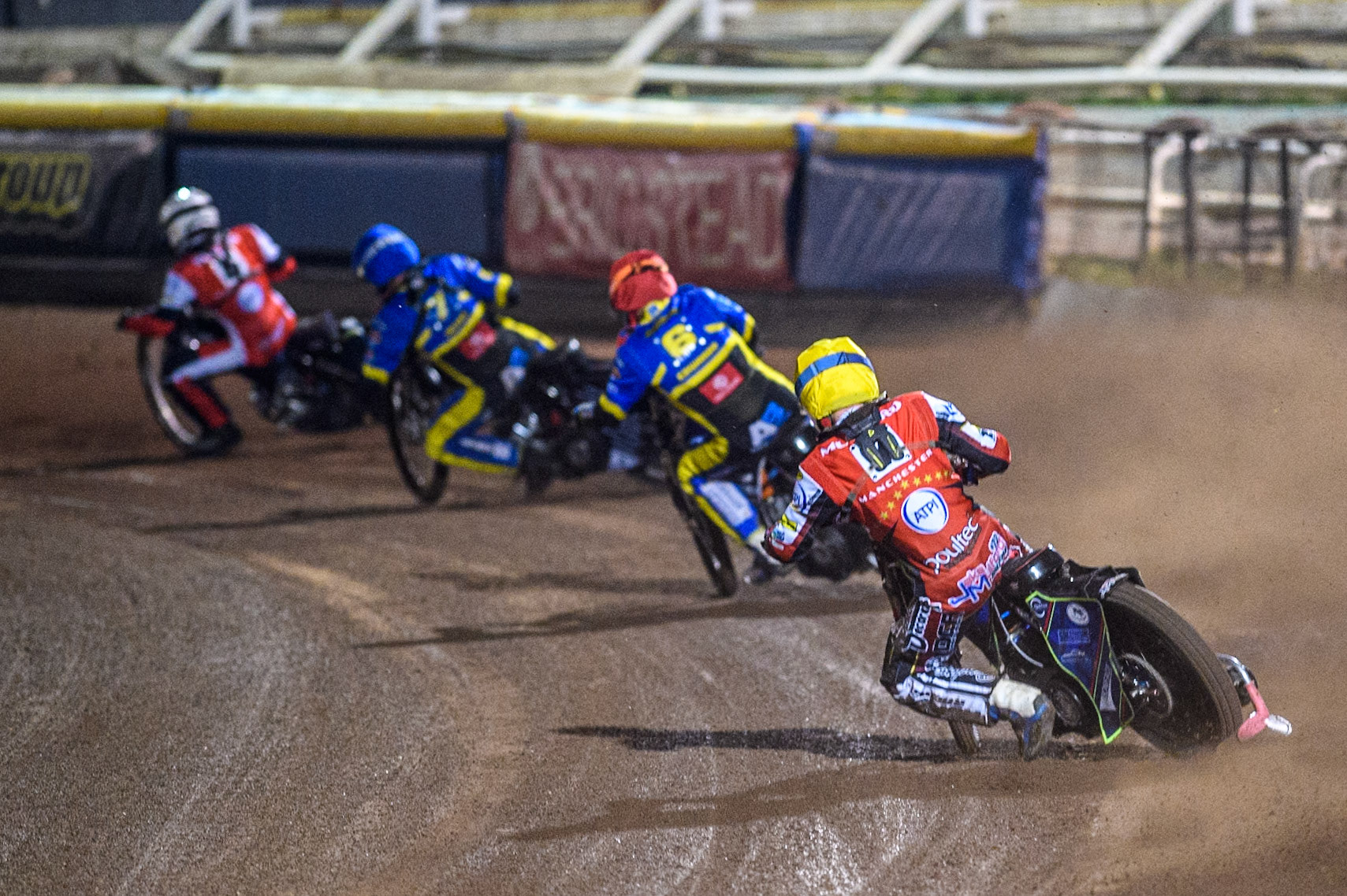 Belle Vue Aces' Jake Mulford  in Yellow chases Sheffield Tigers' Jason Edwards  in Red, Sheffield Tigers' Dan Gilkes  in Blue and Belle Vue Aces' Antti Vuolas  in White during the Rowe Motor Oil Premiership Play Off Semi Final 2nd leg between Sheffield Tigers and Belle Vue Aces at Owlerton Stadium, Sheffield on Thursday 19th September 2024. (Photo: Ian Charles | MI News)