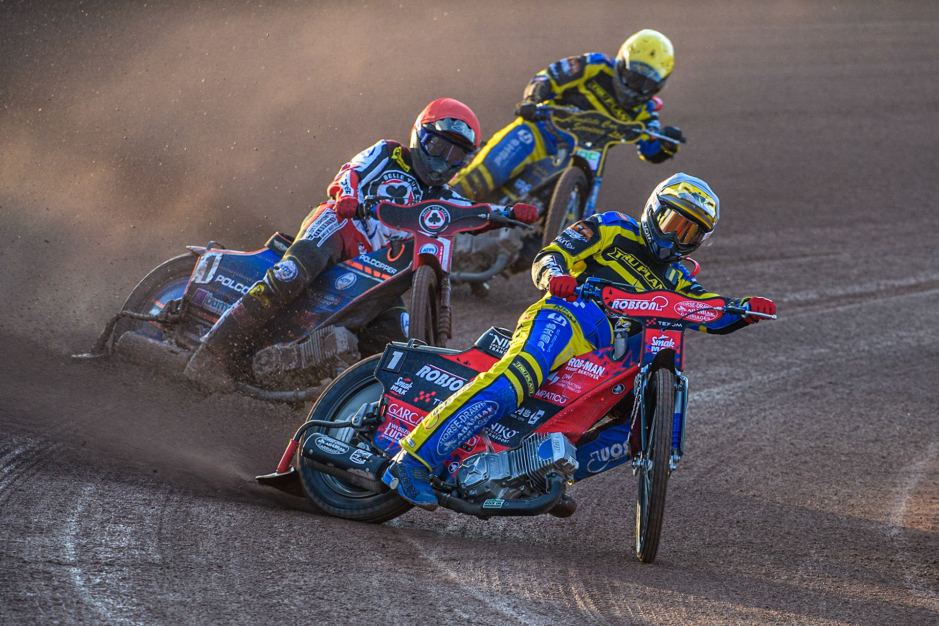 Tobiasz Musielak (White) leads Brady Kurtz (Red) and Kyle Howarth (Yellow) during the Sports Insure Premiership match between Belle Vue Aces and Sheffield Tigers at the National Speedway Stadium, Manchester on Monday 7th August 2023. (Photo: Ian Charles | MI News)