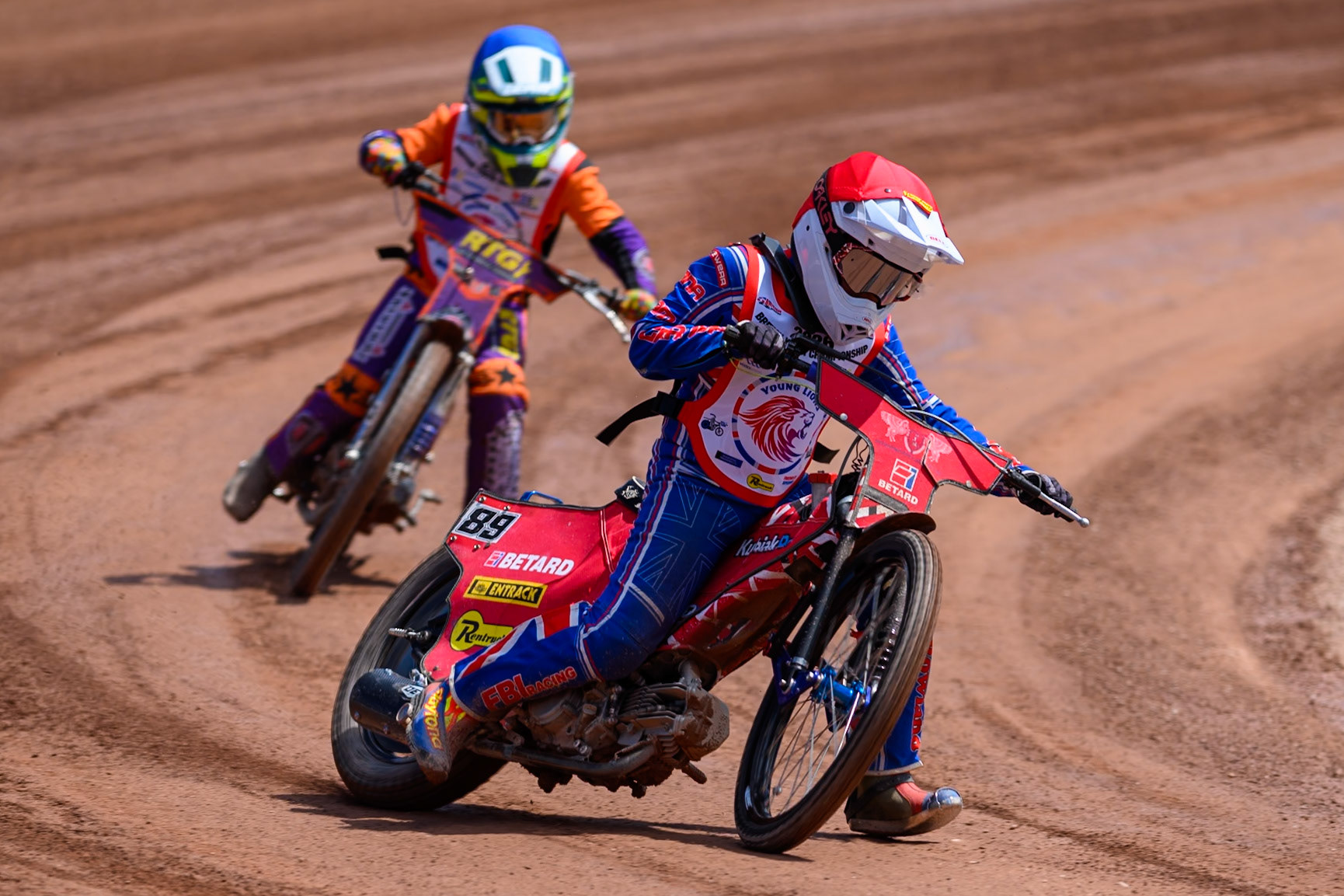 125cc SUPPORT CLASS Aston Knott (89) leading Seb Kelly (57) in Blue during the British Youth Championship (125cc) at the National Speedway Stadium, Manchester on Sunday 19th July 2026. (Photo: Ian Charles | MI News)
