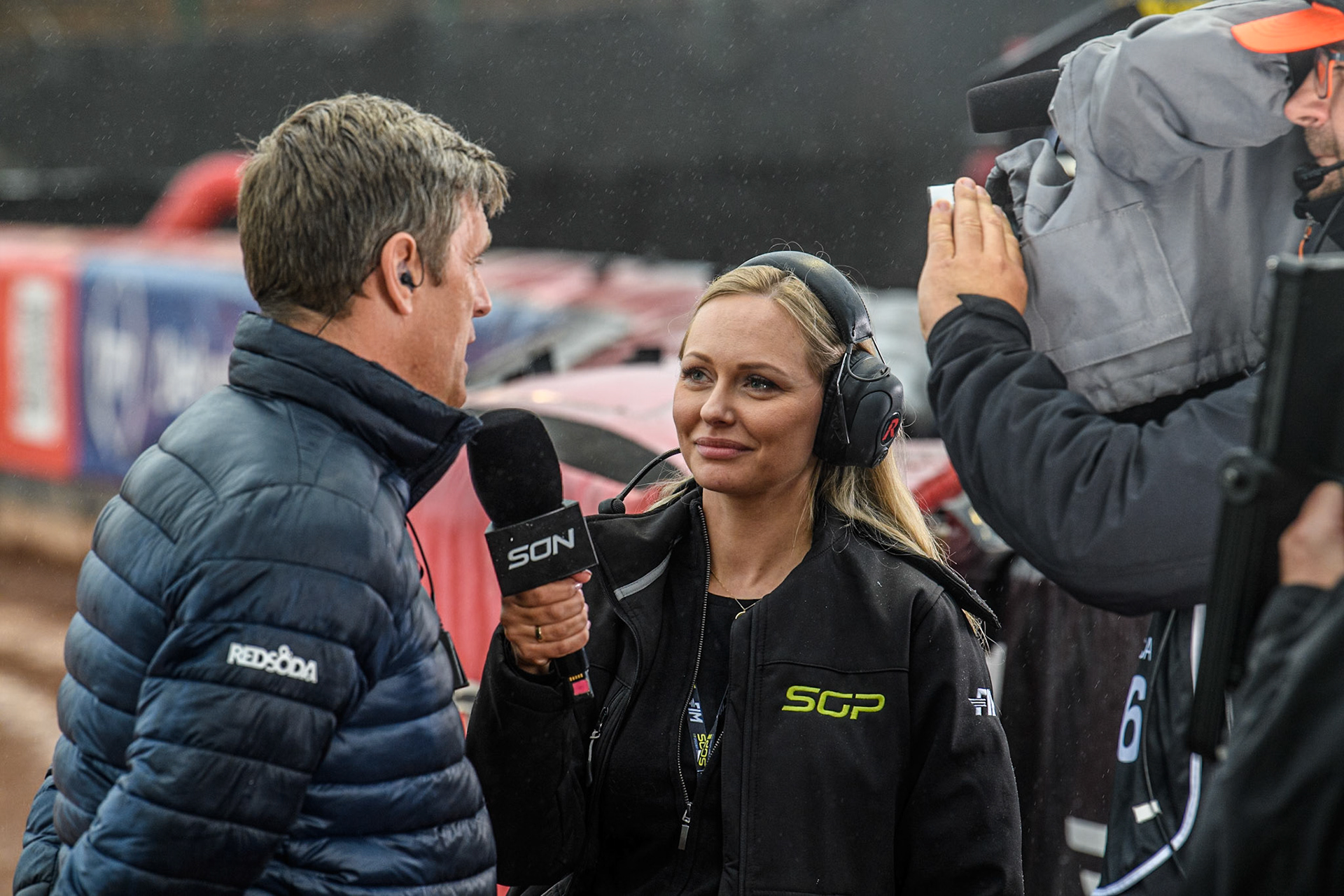 SoN Race director Phil Morris (Left) is interviewed about the rain delay by WBD TV during the Monster Energy FIM Speedway of Nation Semi Final 2 at the National Speedway Stadium, Manchester on Wednesday 10th July 2024. (Photo: Ian Charles | MI News)