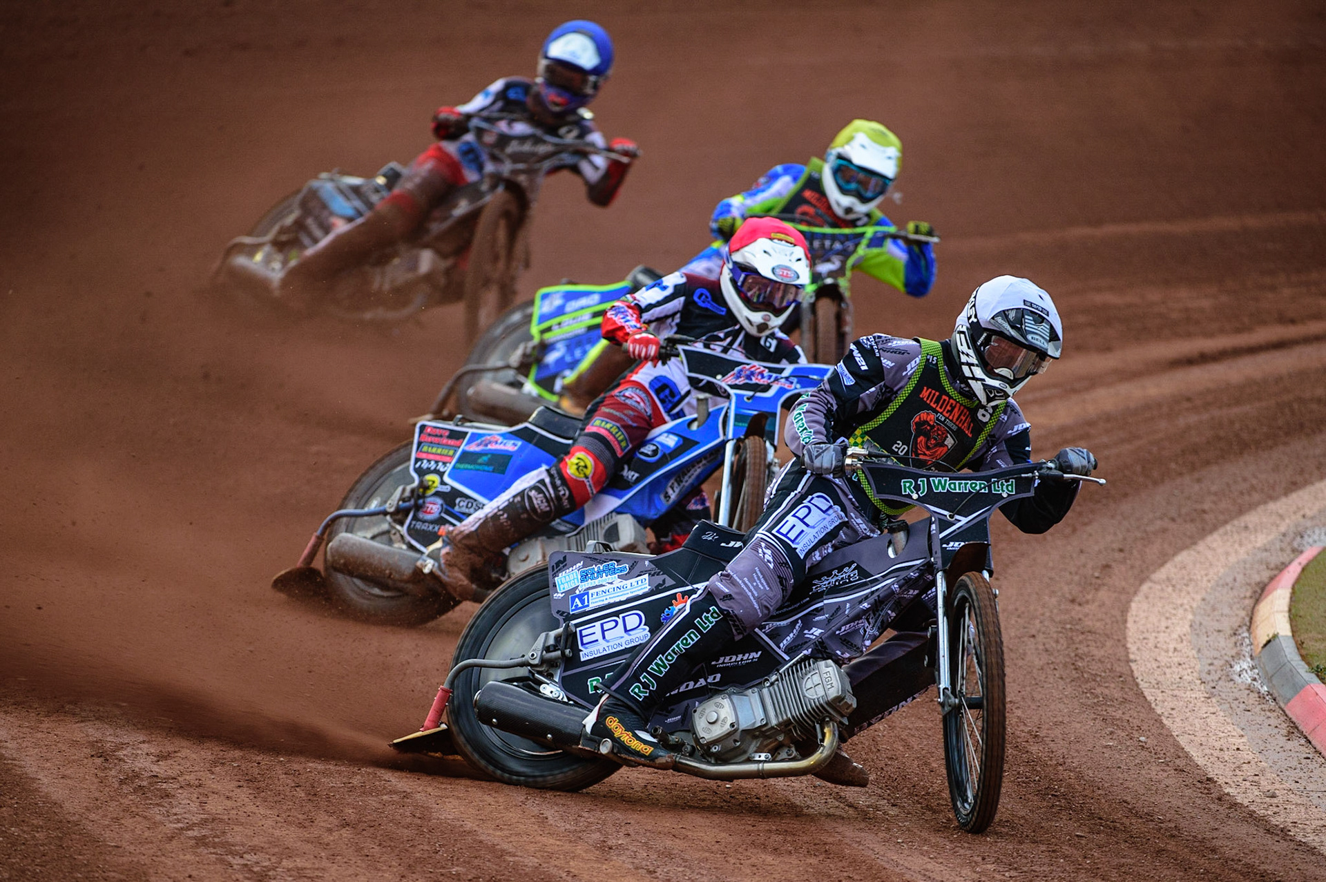 Josh Warren  (White) leads Archie Freeman  (Red) Luke Muff  (Yellow) and Freddy Hodder  (Blue) during the National Development League match between Belle Vue Colts and Mildenhall Fens Tigers at the National Speedway Stadium, Manchester on Friday 15th July 2022. (Credit: Ian Charles | MI News)