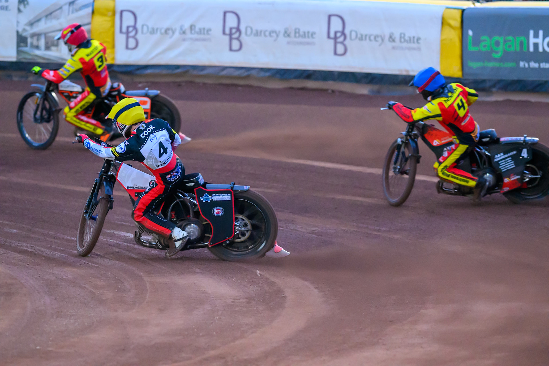 Zach Cook of Belle Vue Aces  in Yellow on the inside of Dan Thompson of Leicester Lions in Blue  as they chase Sam Masters of Leicester Lions in Red during the Rowe Motor Oil Premiership match between Leicester Lions and Belle Vue Aces at the Hydroscan Arena, Leicester on Monday 7th September 2026. (Photo: Ian Charles | MI News)