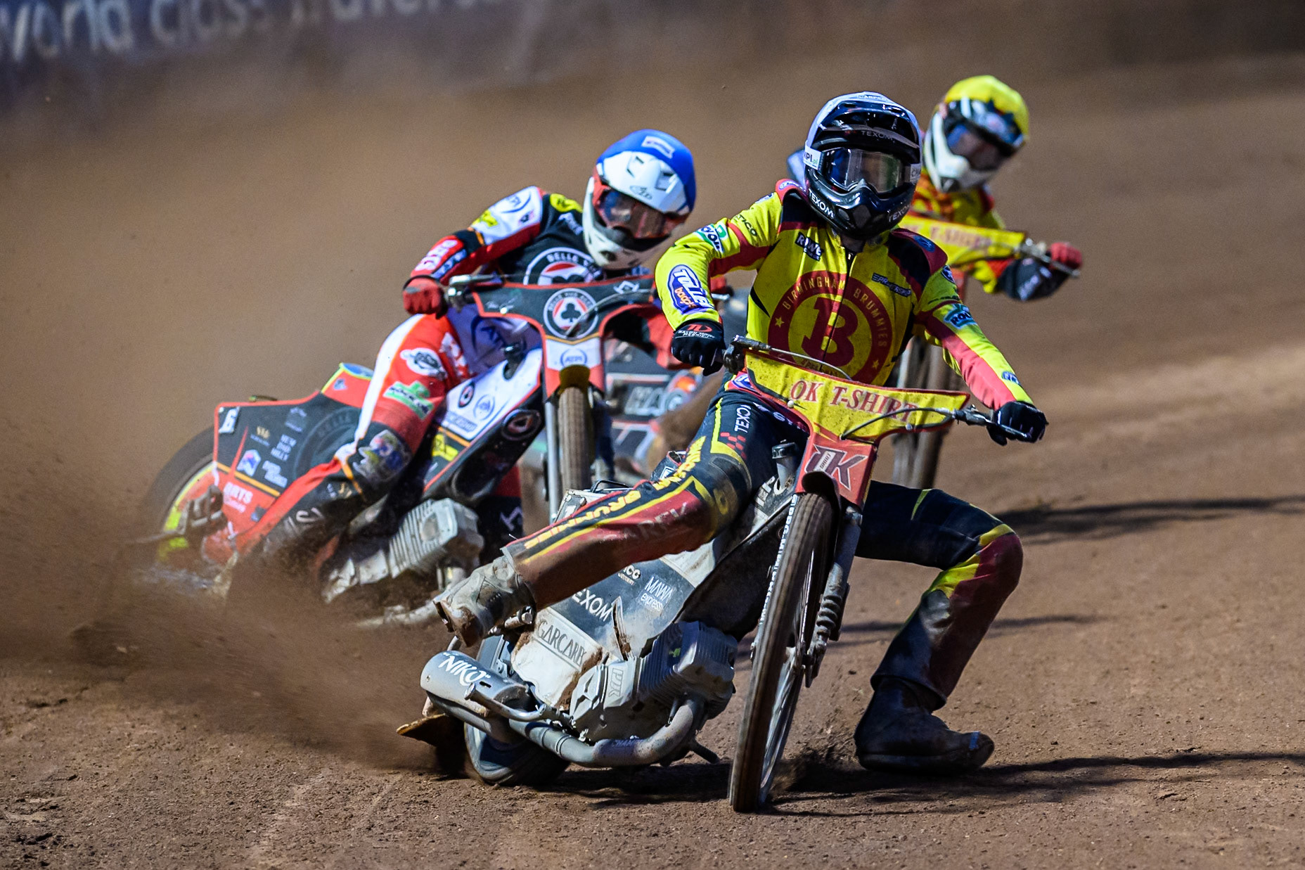 Keynan Rew of Birmingham Brummies  in White leading Norick Blödorn of Belle Vue Aces  in Blue and Paco Castagna of Birmingham Brummies during the Rowe Motor Oil Premiership match between Belle Vue Aces and Birmingham Brummies at the National Speedway Stadium, Manchester on Monday 18th August 2025. (Photo: Ian Charles | MI News)