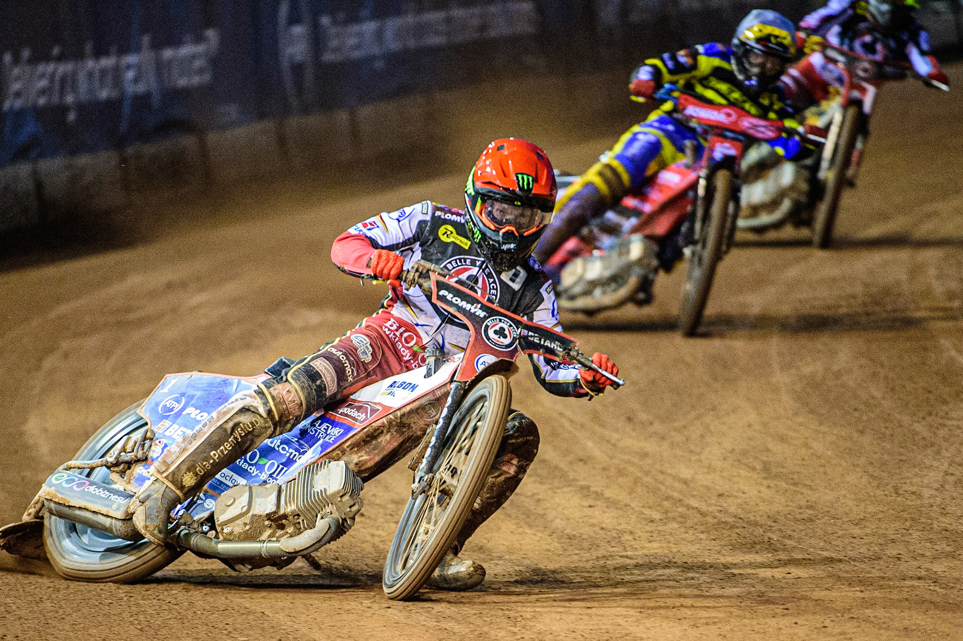 Dan Bewley  (Red) leads Tobiasz Musielak  (White) and Norick Blodorn  (Blue)during the SGB Premiership match between Belle Vue Aces and Sheffield Tigers at the National Speedway Stadium, Manchester on Monday 27th March 2023. (Photo: Ian Charles | MI News)
