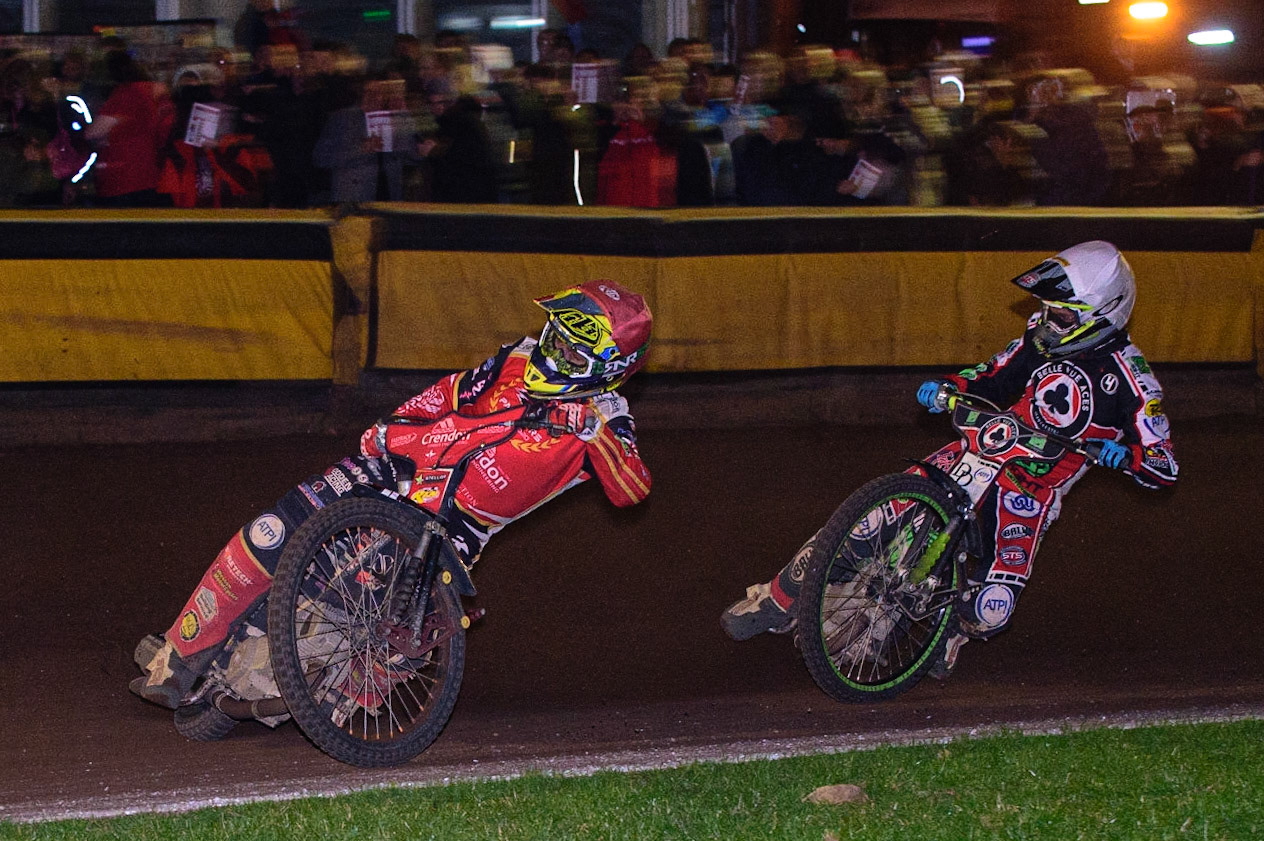 PETERBOROUGH, UK. OCT 14TH Scott Nicholls  (Red) leads Charles Wright  (White) during the SGB Premiership Grand Final 2nd leg between Peterborough and Belle Vue Aces at East of England Showground, Peterborough on Thursday 14th October 2021. (Credit: Ian Charles | MI News)