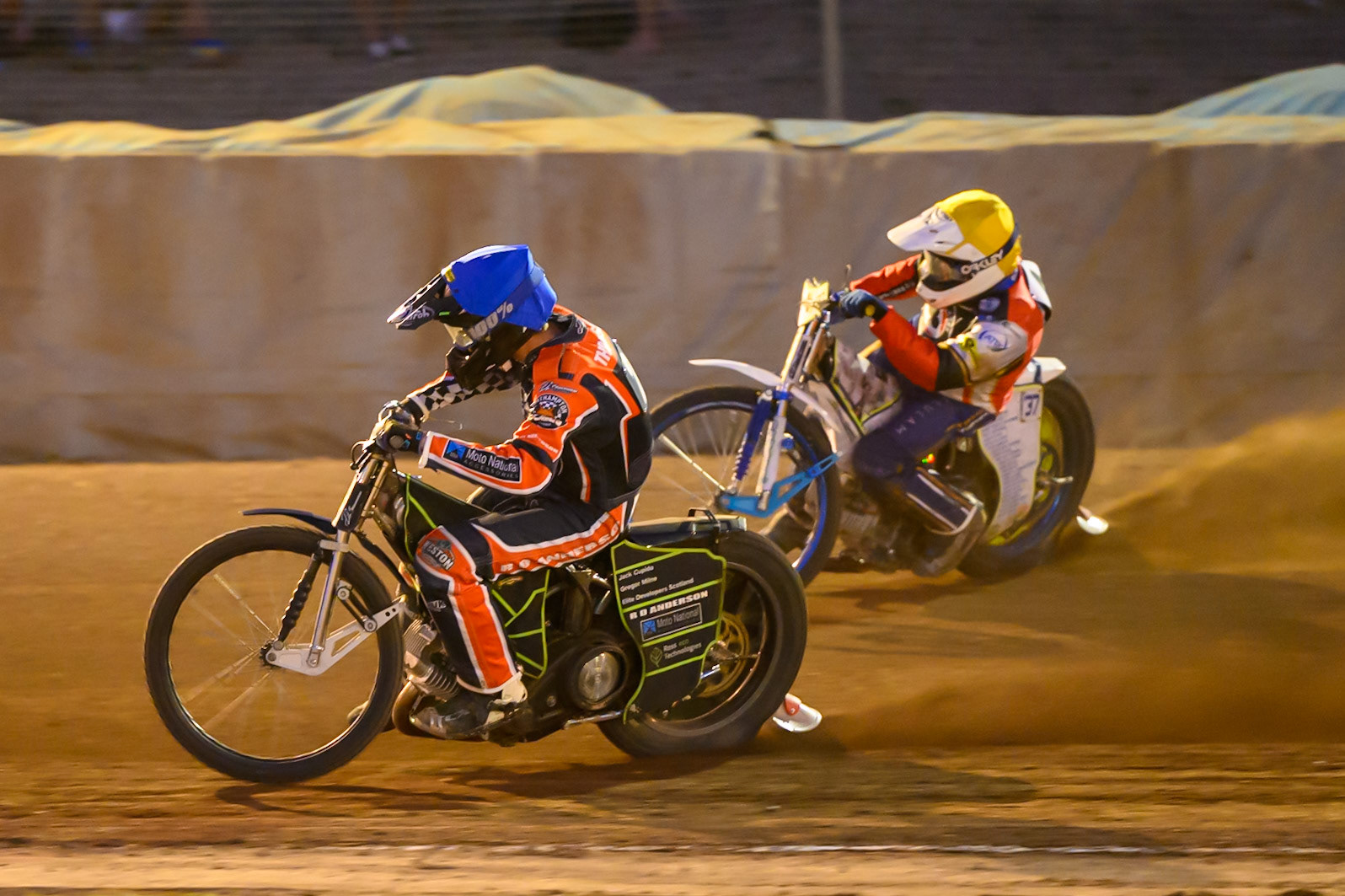 Kye Thomson of Northampton Foxes in Blue rides inside Adam Ellis of Northampton Foxes  in Yellow during the Rowe Motor Oil Premiership match between Northampton Foxes and Belle Vue Aces at Northampton International Shaleway, Northampton on Thursday 13th August 2026. (Photo: Ian Charles | MI News)
