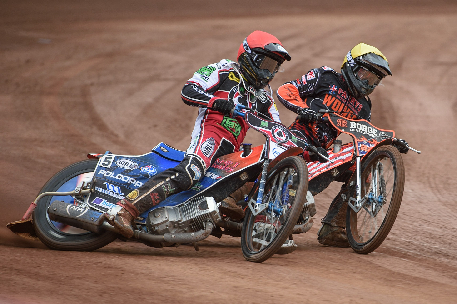 MANCHESTER, UK. AUGUST 30TH Brady Kurtz  (Red) and Luke Becker  (Yellow) battle it out during the SGB Premiership match between Belle Vue Aces and Wolverhampton Wolves at the National Speedway Stadium, Manchester on Monday 30th August 2021. (Credit: Ian Charles | MI News)