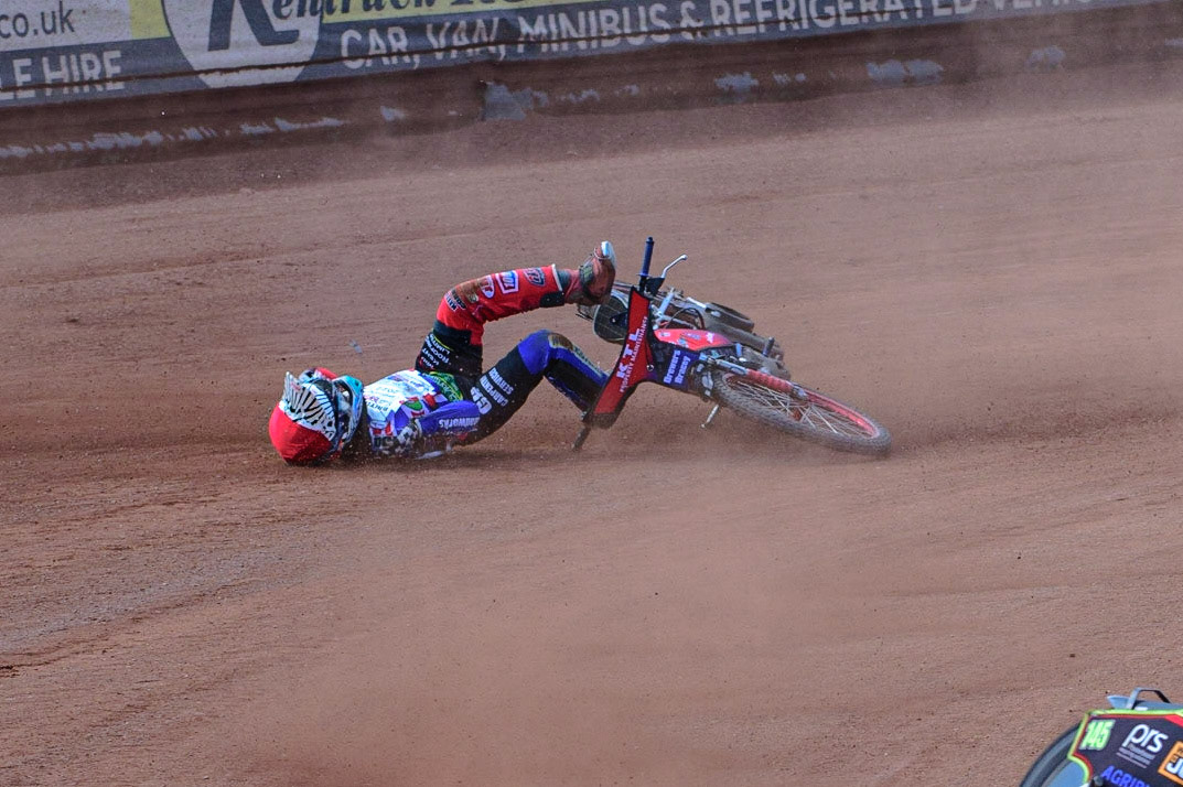 MANCHESTER, UK. JUN 3RD Charlie Wood (33) (Red) crashes behind William Cairns (145)  (Blue) during the British Youth Speedway Championship (Round 4)  at the National Speedway Stadium, Manchester on Friday 3rd June 2022. (Credit: Ian Charles | MI News)