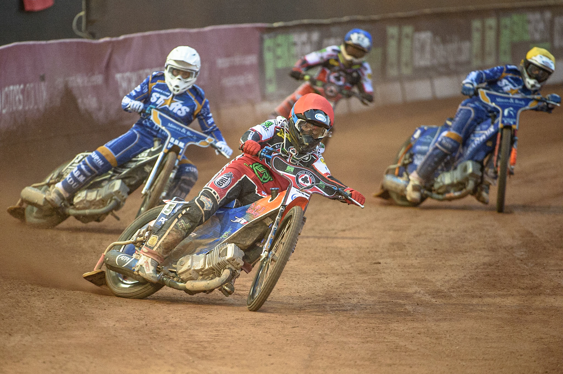 MANCHESTER, UK. AUGUST 23RD    Brady Kurtz  (Red) leads Erik Riss  (White) and Lewis Kerr   (Yellow) with Tom Brennan  (Blue) behind during the SGB Premiership match between Belle Vue Aces and King's Lynn Stars at the National Speedway Stadium, Manchester on Monday 23rd August 2021. (Credit: Ian Charles | MI News)