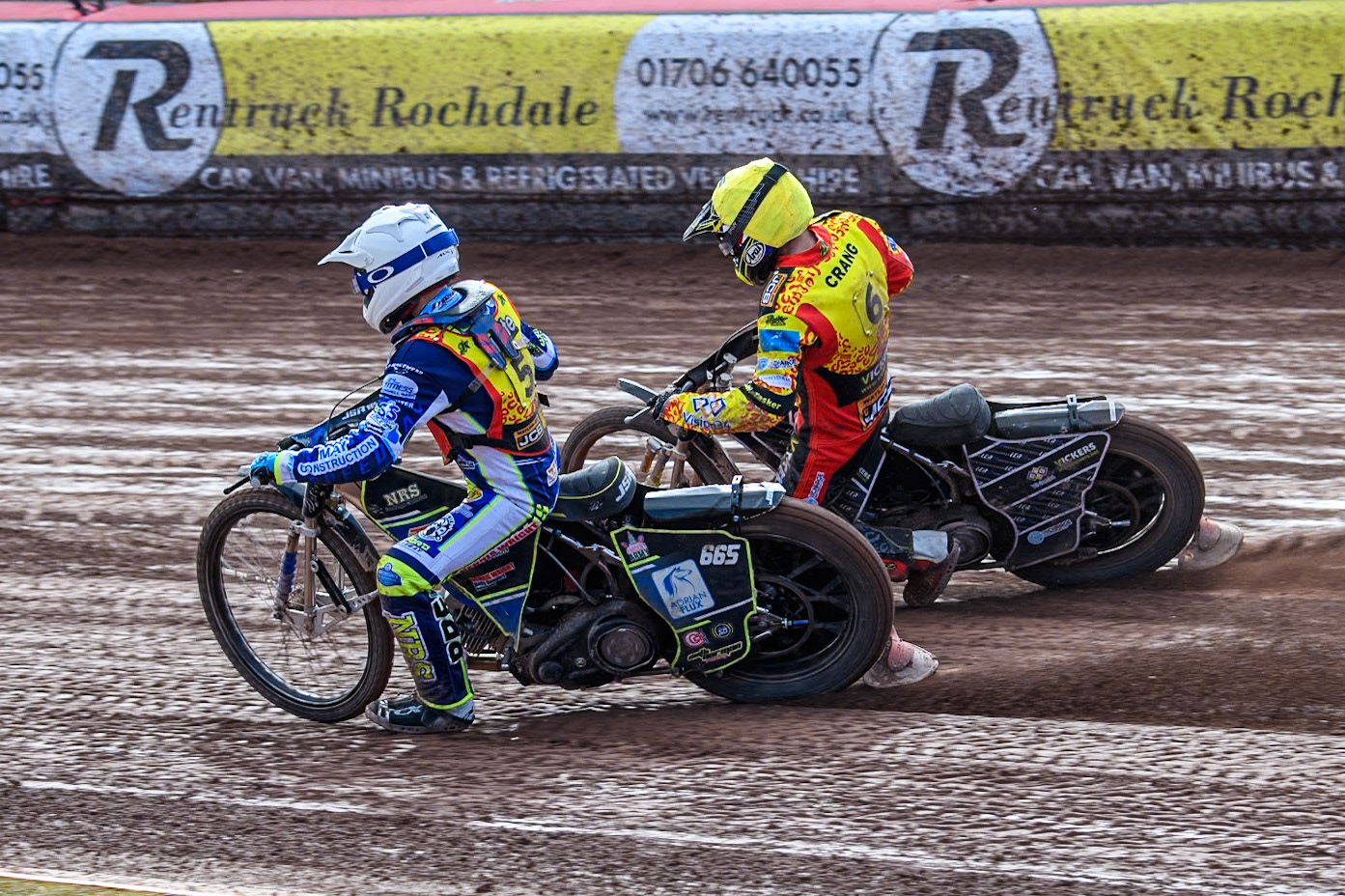Leicester Lion Cubs' Jody Scott (White) inside team mate Luke Crang (Yellow) during the WSRA National Development League match between Belle Vue Colts and Leicester Lion Cubs at the National Speedway Stadium, Manchester on Friday 29th March 2024. (Photo: Ian Charles | MI News)