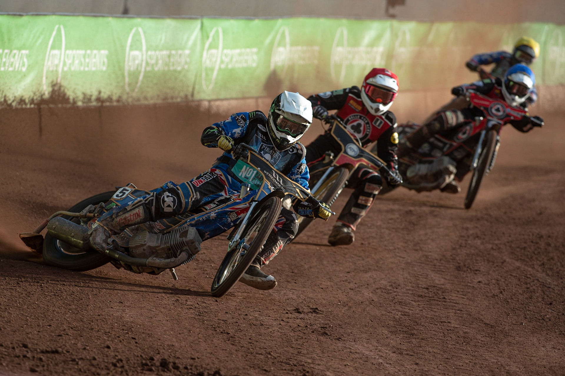 Photo by Ian Charles

Jack Holder  (White) leads Max Fricke  (Red) and Jaimon Lidsey  (Blue) with Jye Etheridge  (Yellow) behind

Belle Vue Aces v Poole Pirates, British Speedway Premiership, Belle Vue National Speedway Stadium, Manchester, Monday 1  July  2019
