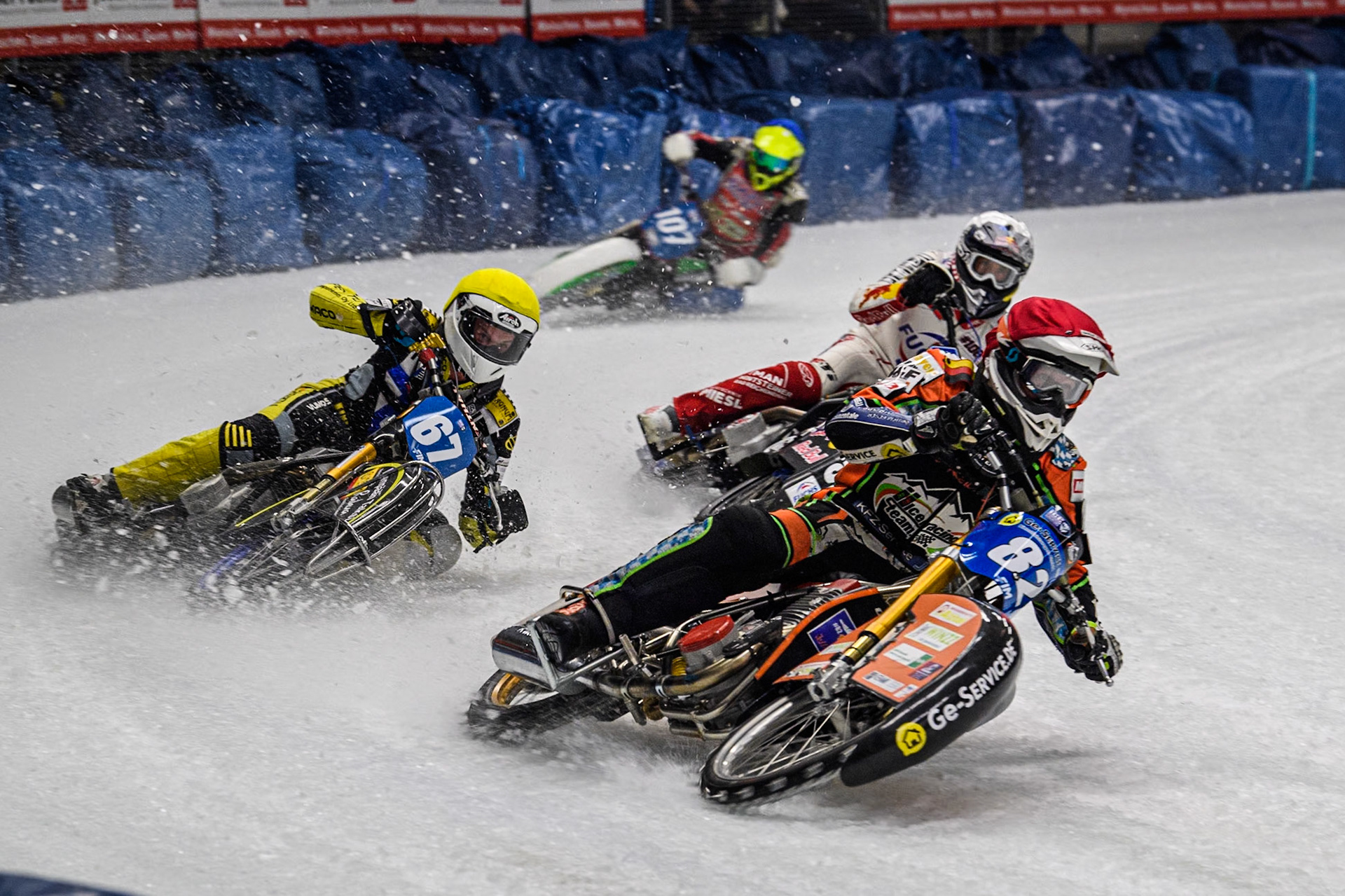 Germany's Markus Jell (82) (Red) leads  Finland's Heikki Huusko (67) (Yellow) Austria's Franz Zorn (100) (White) and Czech Republic's Andrej Diviš (107) (Blue) during the FIM Ice Speedway Gladiators World Championship Final 1 at the Max-Aicher-Arena, Inzell on Saturday 23 March 2024. (Photo: Ian Charles | MI News)