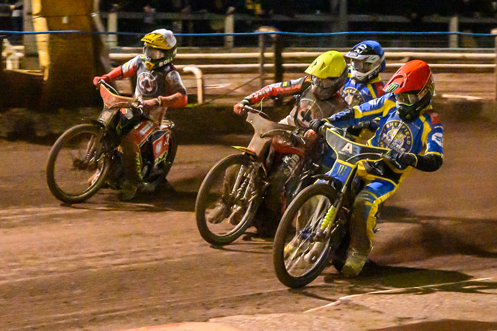 Chris Holder of Sheffield Tigers in Red on the inside of Tate Zischke of Belle Vue Aces in Yellow and Mitch McDiarmid, Guest rider for Belle Vue Aces in White  with Jye Etheridge of Sheffield Tigers in Blue  behind during the Rowe Motor Oil Premiership Grand Final 1st Leg match between Sheffield Tigers and Belle Vue Aces at Owlerton Stadium, Sheffield on Monday 12th October 2026. (Photo: Ian Charles | MI News)