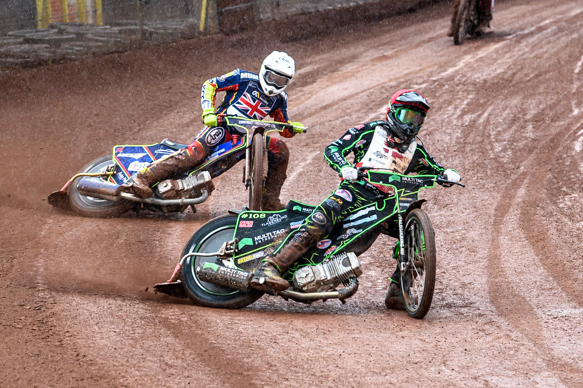 Villads Nagel of Denmark in Red leading Jake Mulford of Great Britain in White during the FIM SGP2 Qualifying Round at the Peugeot Ashfield Stadium in Glasgow on Saturday 24th May 2025. (Photo: Ian Charles | MI News)