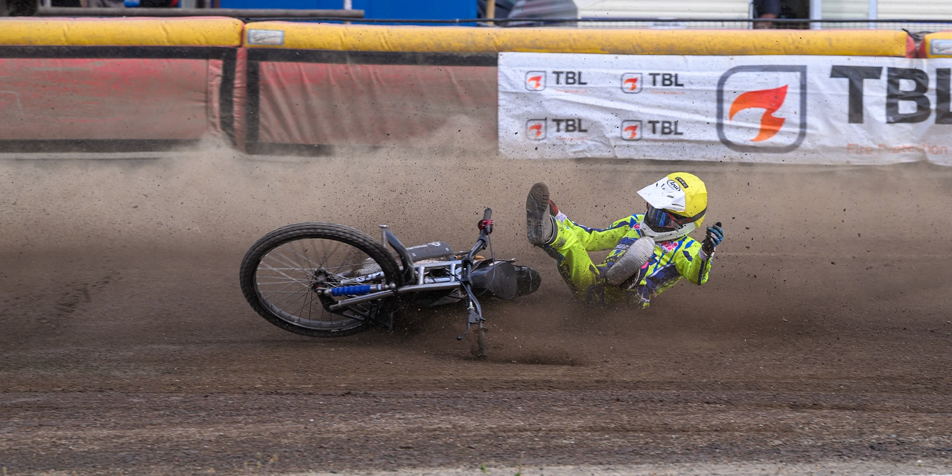 Harry Fletcher of Oxford Chargers in Yellow  falls during the WSRA National Development League match between Buxton Bulls and Oxford Chargers at Hi-Edge Speedway, Buxton on Sunday 2nd August 2026. (Photo: Ian Charles | MI News)