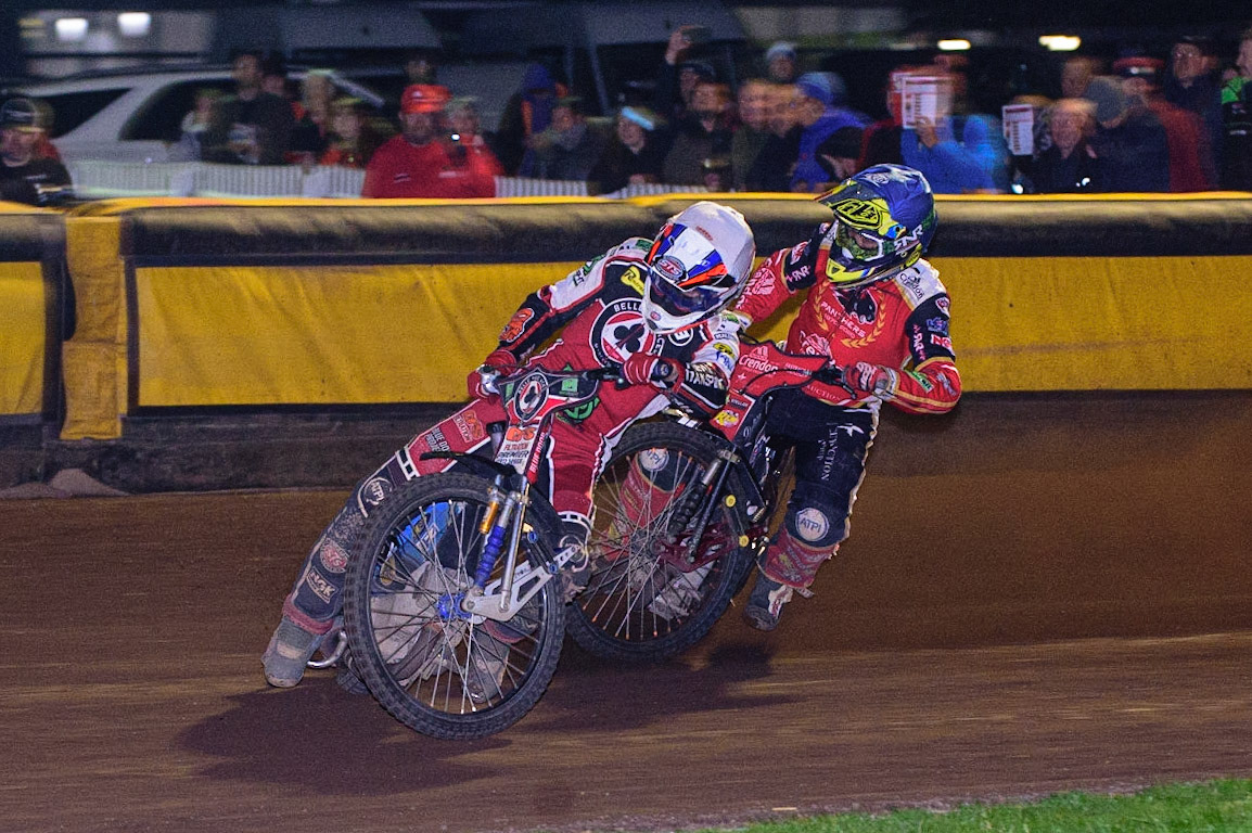 PETERBOROUGH, UK. OCT 14TH Steve Worrall  (White) tries to hold off Scott Nicholls  (Blue) during the SGB Premiership Grand Final 2nd leg between Peterborough and Belle Vue Aces at East of England Showground, Peterborough on Thursday 14th October 2021. (Credit: Ian Charles | MI News)