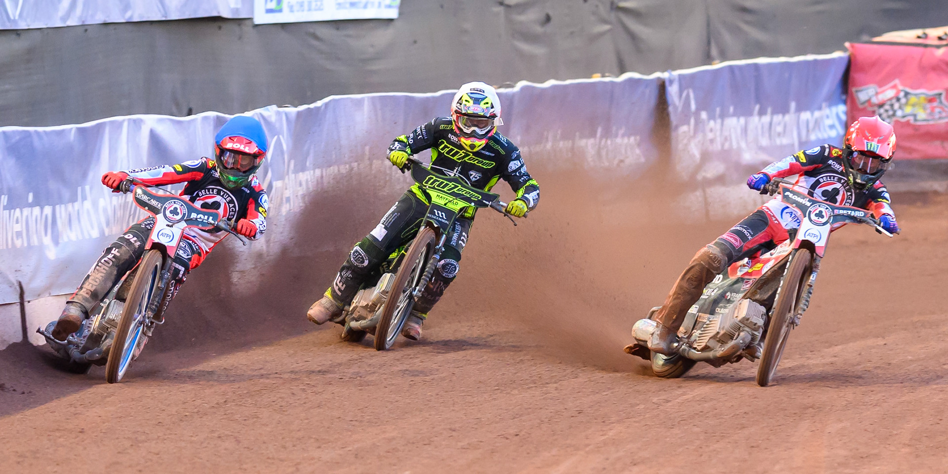 Brady Kurtz of Belle Vue Aces  in Blue and Dan Bewley of Belle Vue Aces  in Red leading Richard Lawson of Ipswich Witches in White during the Rowe Motor Oil Premiership match between Belle Vue Aces and Ipswich Witches at the National Speedway Stadium, Manchester on Monday 20th April 2026. (Photo: Ian Charles | MI News)