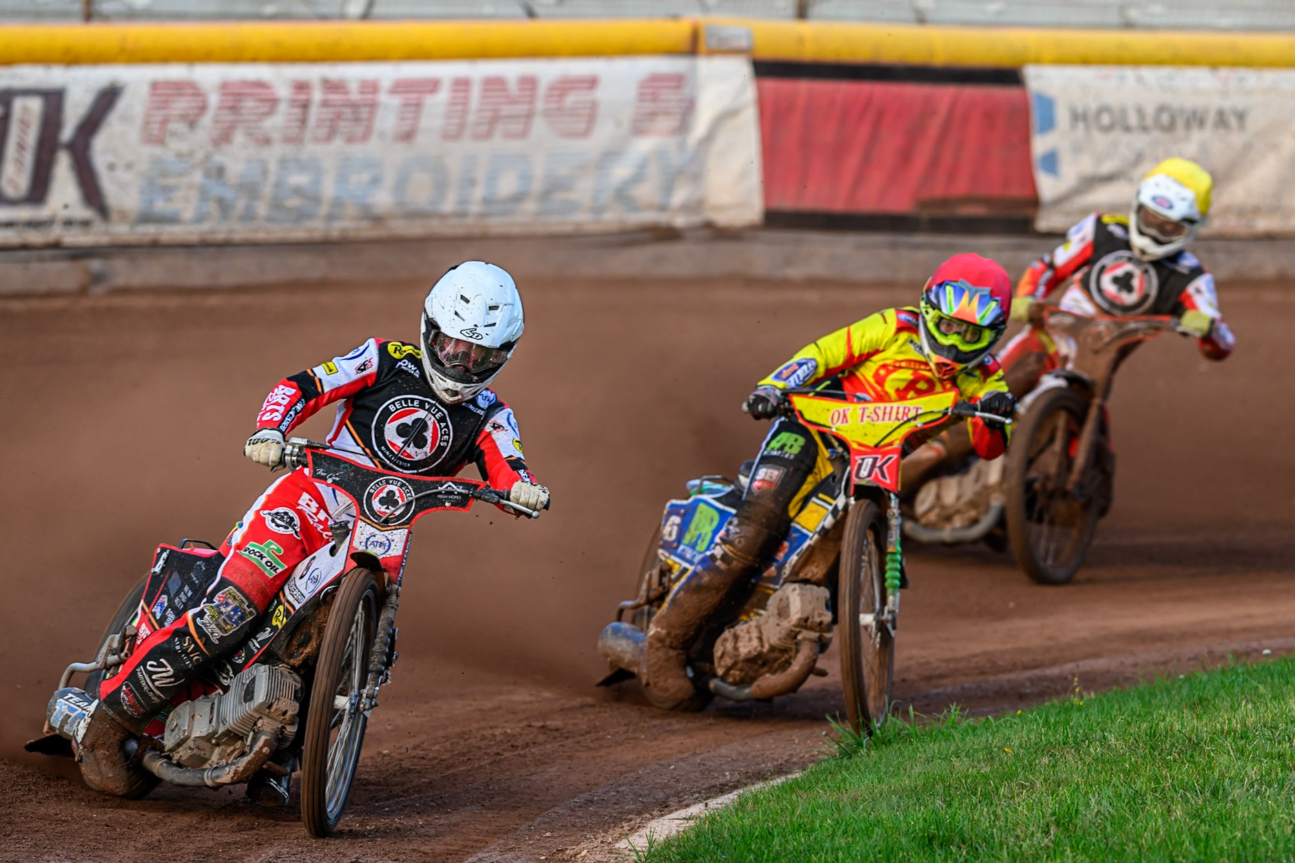 Belle Vue Aces' Tate Zischke  in White leading Birmingham Brummies' Ben Barker  in Red and Belle Vue Aces' Jake Mulford in Yellow during the Rowe Motor Oil Premiership match between Birmingham Brummies and Belle Vue Aces at Perry Barr Stadium, Birmingham on Monday 28th July 2025. (Photo: Ian Charles | MI News)