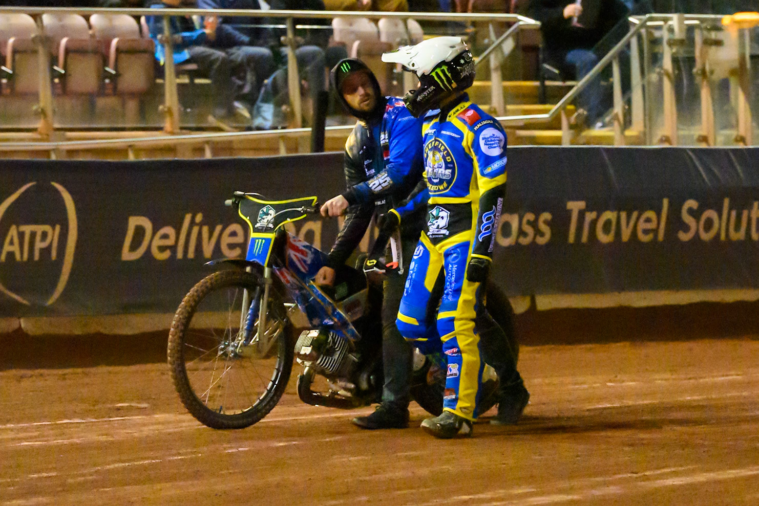 Jack Holder of Sheffield Tigers   walks back to the pits with his mechanic after his bike malfunctioned on the start line during the Knockout Cup, Northern Section match between Belle Vue Aces and Sheffield Tigers at the National Speedway Stadium, Manchester on Monday 30th March 2026. (Photo: Ian Charles | MI News)