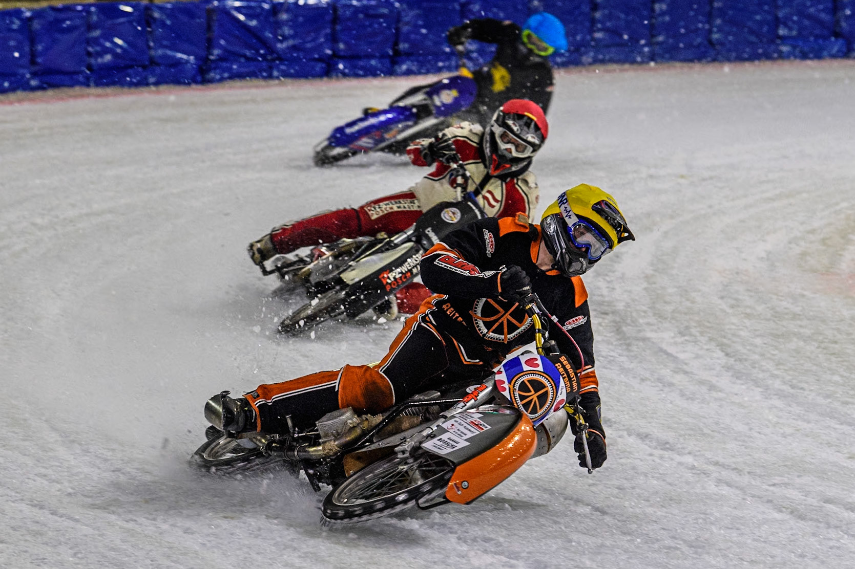 Sebastian Reitsma of The Netherlands in Yellow rides outside Martin Posch of Austria in Red with Leon Kramer of The Netherlands in Blue behind during the Roelof Thijs Bokaal at Ice Rink Thialf, Heerenveen, The Netherlands on Friday 5th April 2024. (Photo: Ian Charles | MI News)