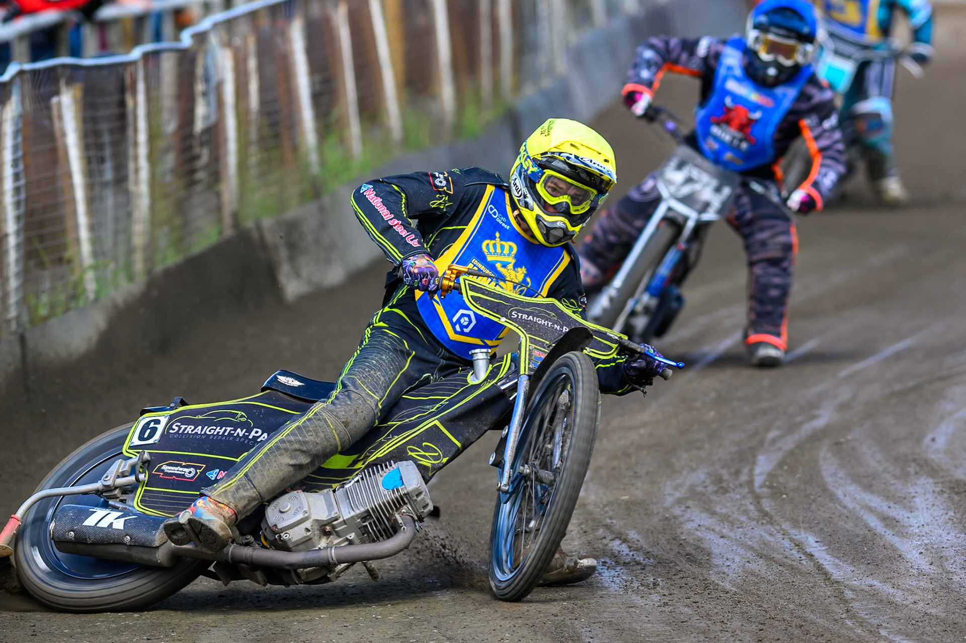 Ben Whalley of Edinburgh Monarchs Academy in Yellow leading Jack Roberts of Buxton Bulls in Blue during the WSRA National Development League match between Buxton Bulls and Edinburgh Monarchs Academy at Hi-Edge Speedway, Buxton on Sunday 14th June 2026. (Photo: Ian Charles | MI News)