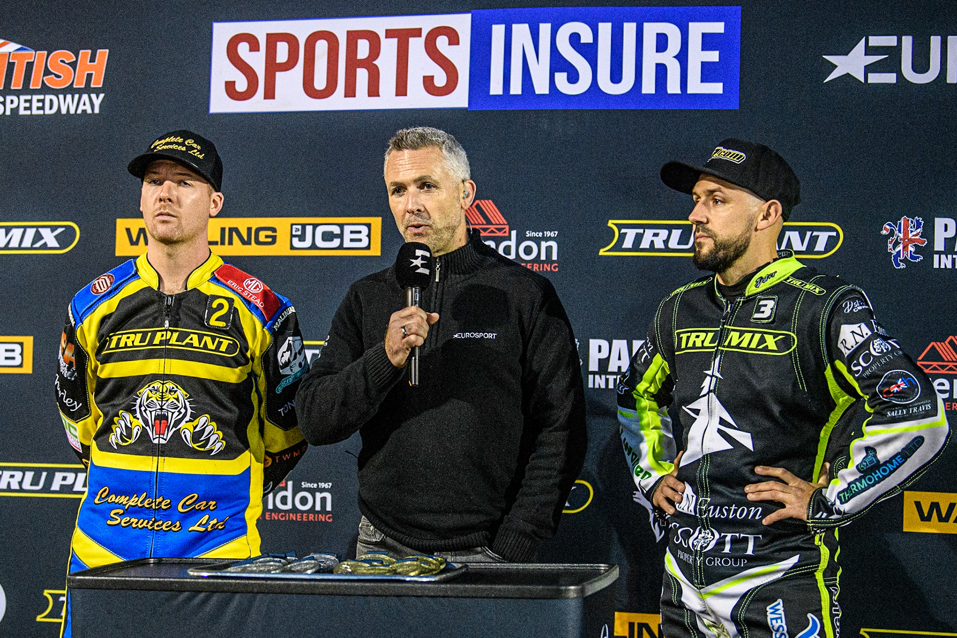 Scott Nicholls (Centre) introduces the captains for the Eurosport viewers Kyle Howarth (Left) and Danny King (Right) during the Sports Insure Premiership Grand Final Second Leg match between Sheffield Tigers and Ipswich Witches at Owlerton Stadium, Sheffield on Thursday 5th October 2023. (Photo: Ian Charles | MI News)